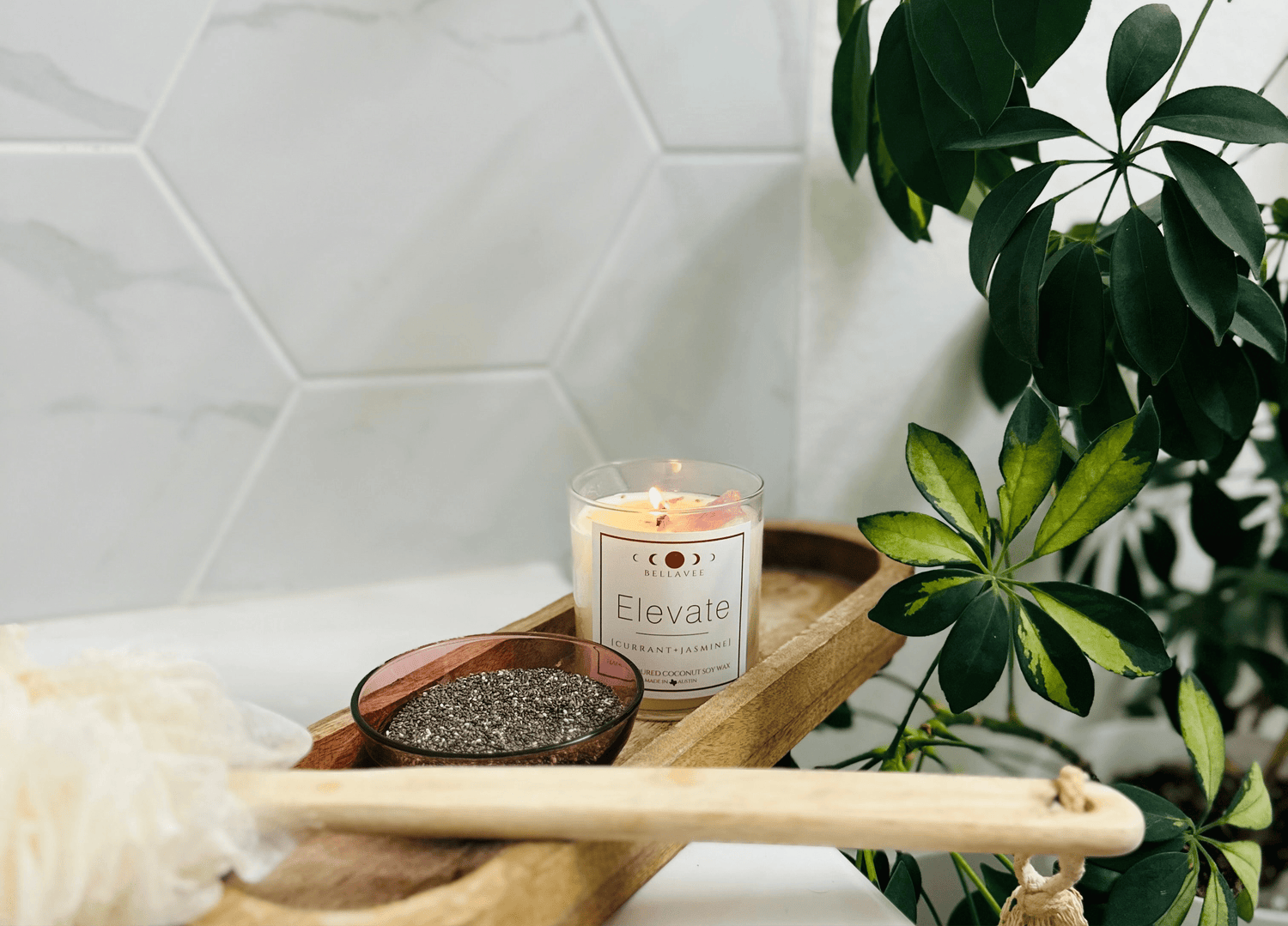 lit bellavee elevate amethyst crystal candle, soothing black currant and jasmine aroma, promotes relaxation and stress relief