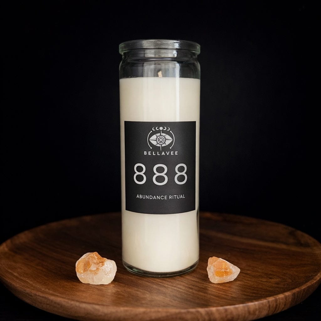 888 Abundance ritual candle in a tall glass jar, hand-poured coconut wax candle symbolizing prosperity and expansion, styled with crystals.