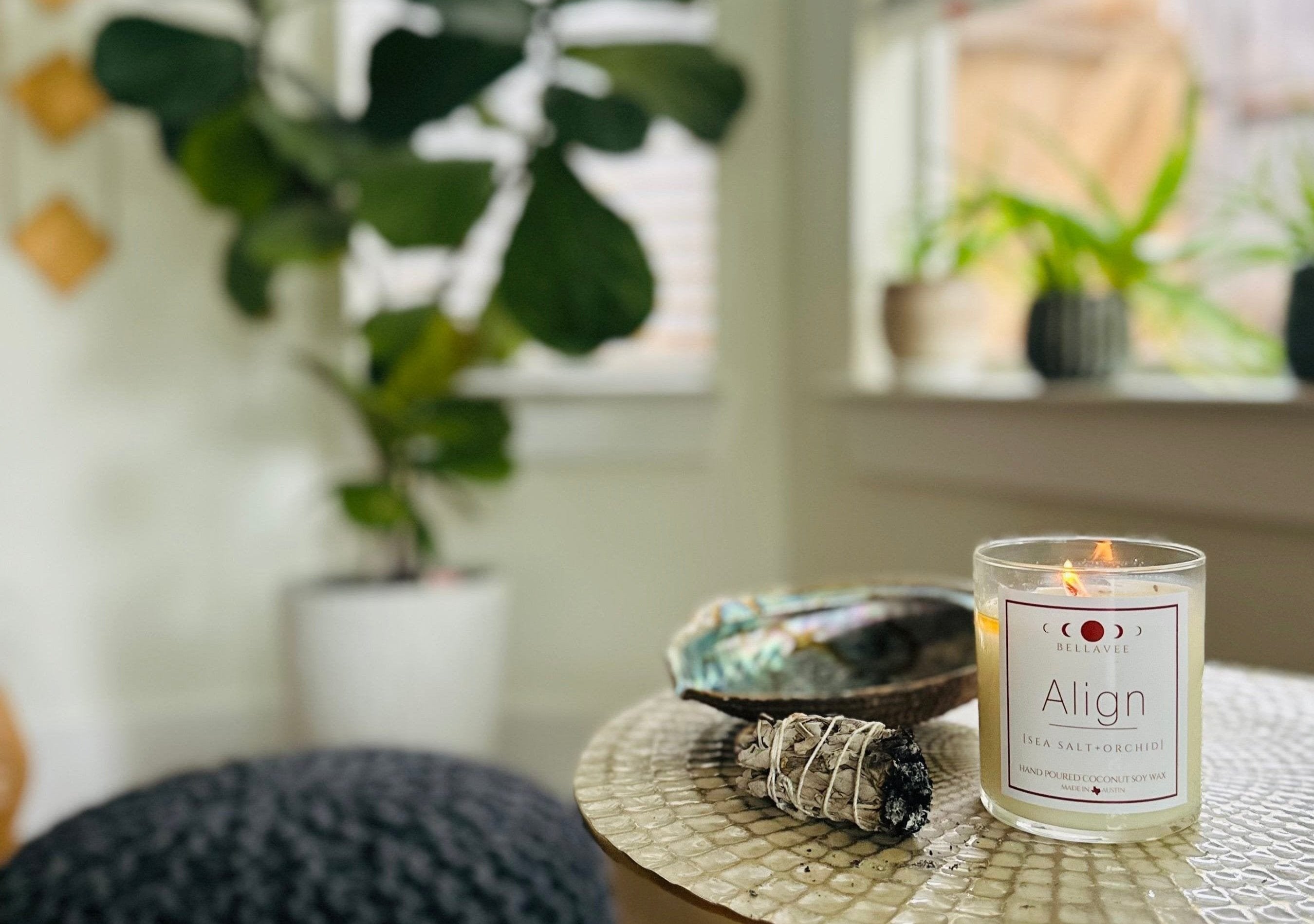 all natural meditation crystal candle topped with a clear quartz crystal, infused with crystals for mindfulness and relaxation, made with eco-friendly coconut wax