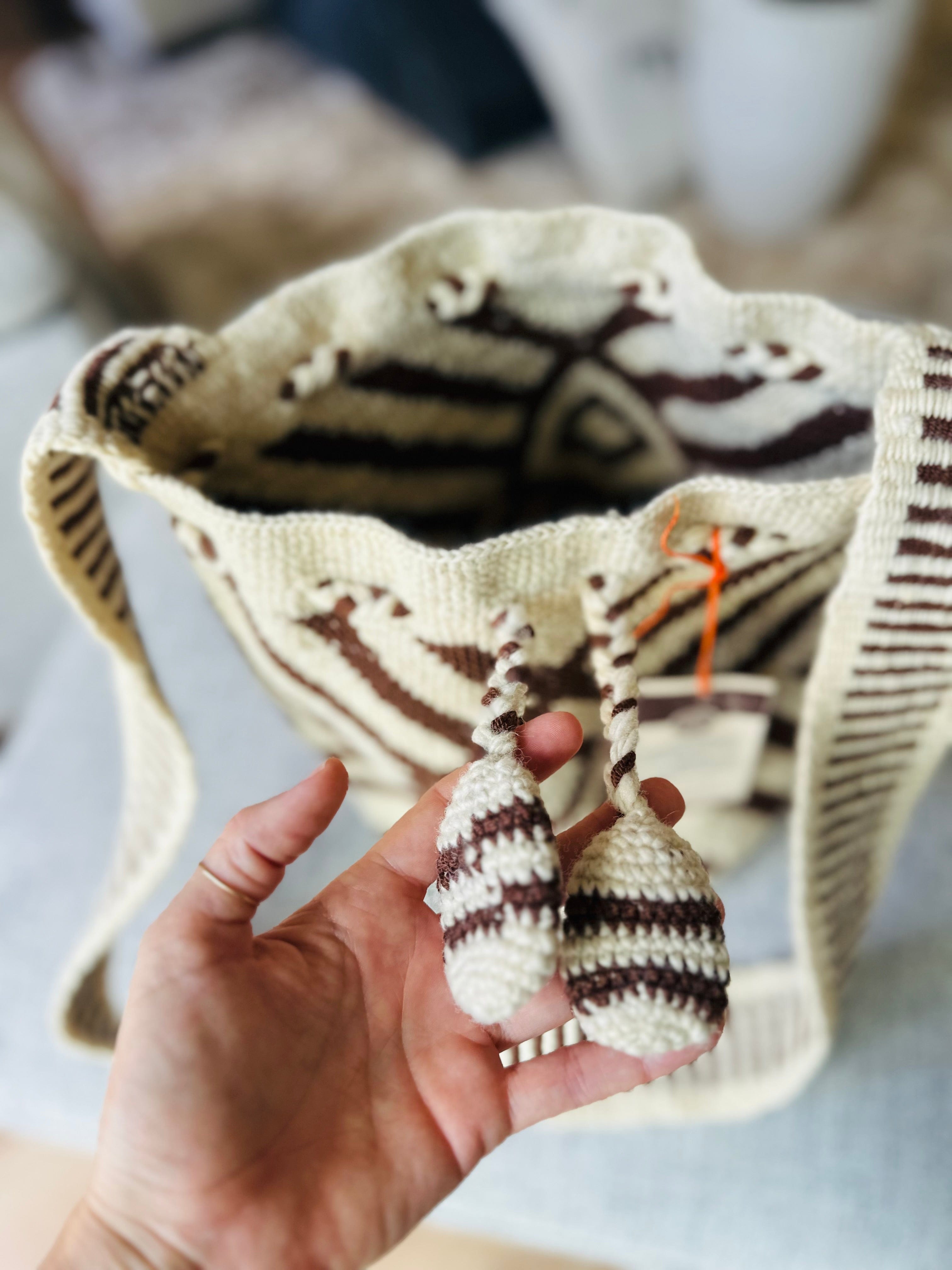 cosmic space crossbody bag, symbolizing the solar calendar and spiritual beings, handcrafted using traditional colombian weaving techniques
