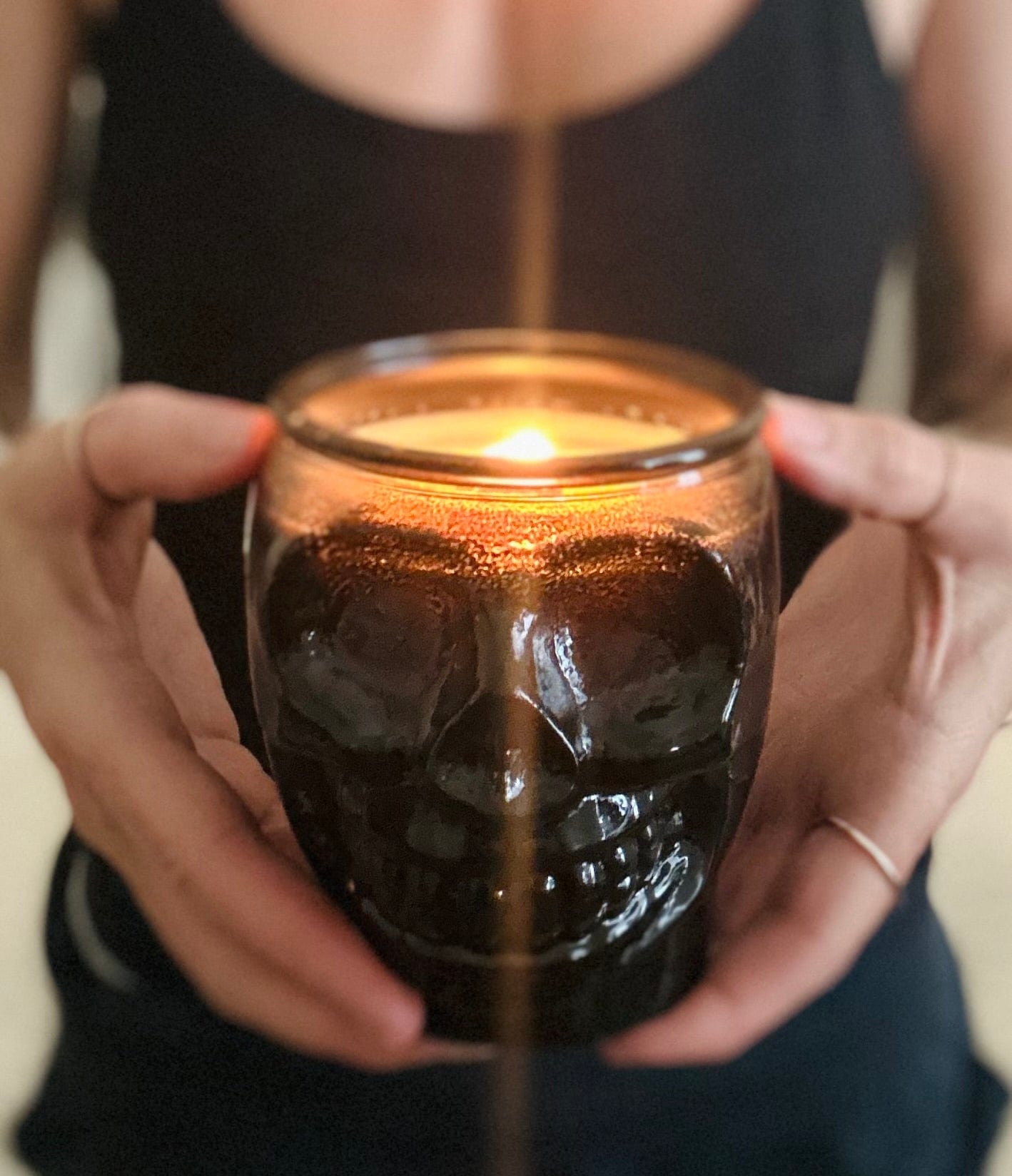 Black skull candle recycled glass. Scented with leather and spice