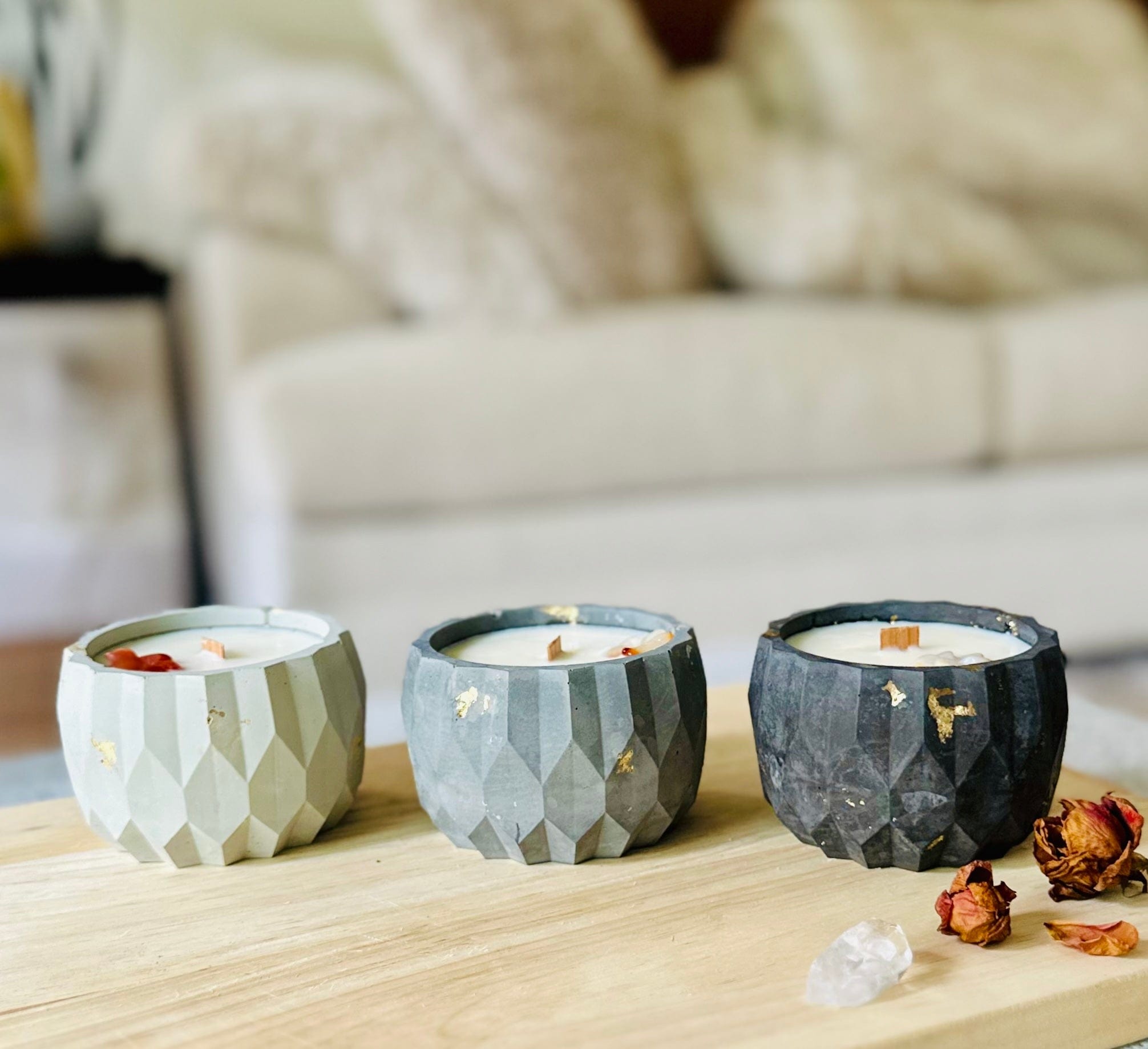 Candle trio showing light, medium, and dark cement finishes