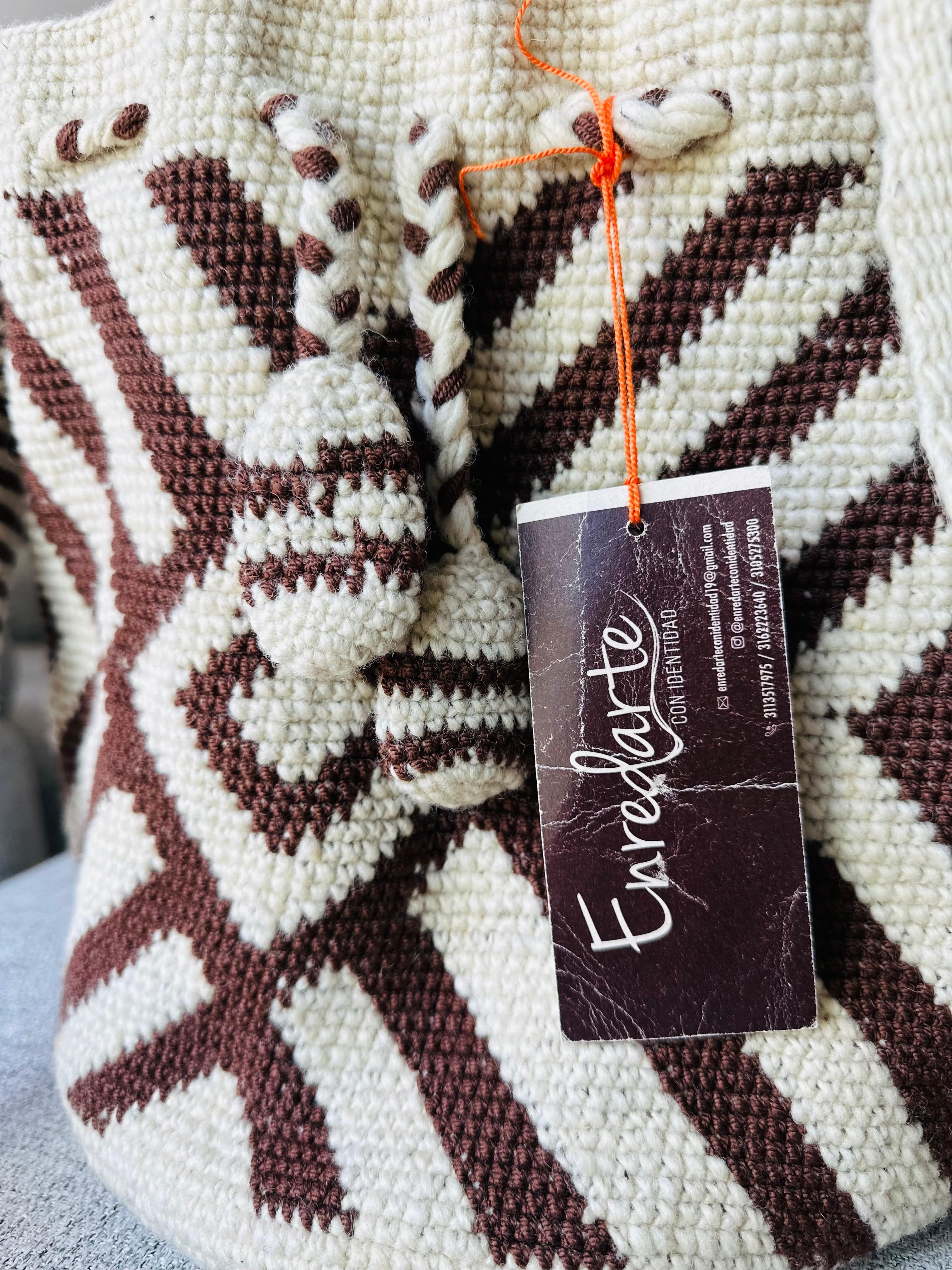 cosmic space crossbody bag, celebrating indigenous nasa culture, handcrafted with natural fibers, representing spiritual connection
