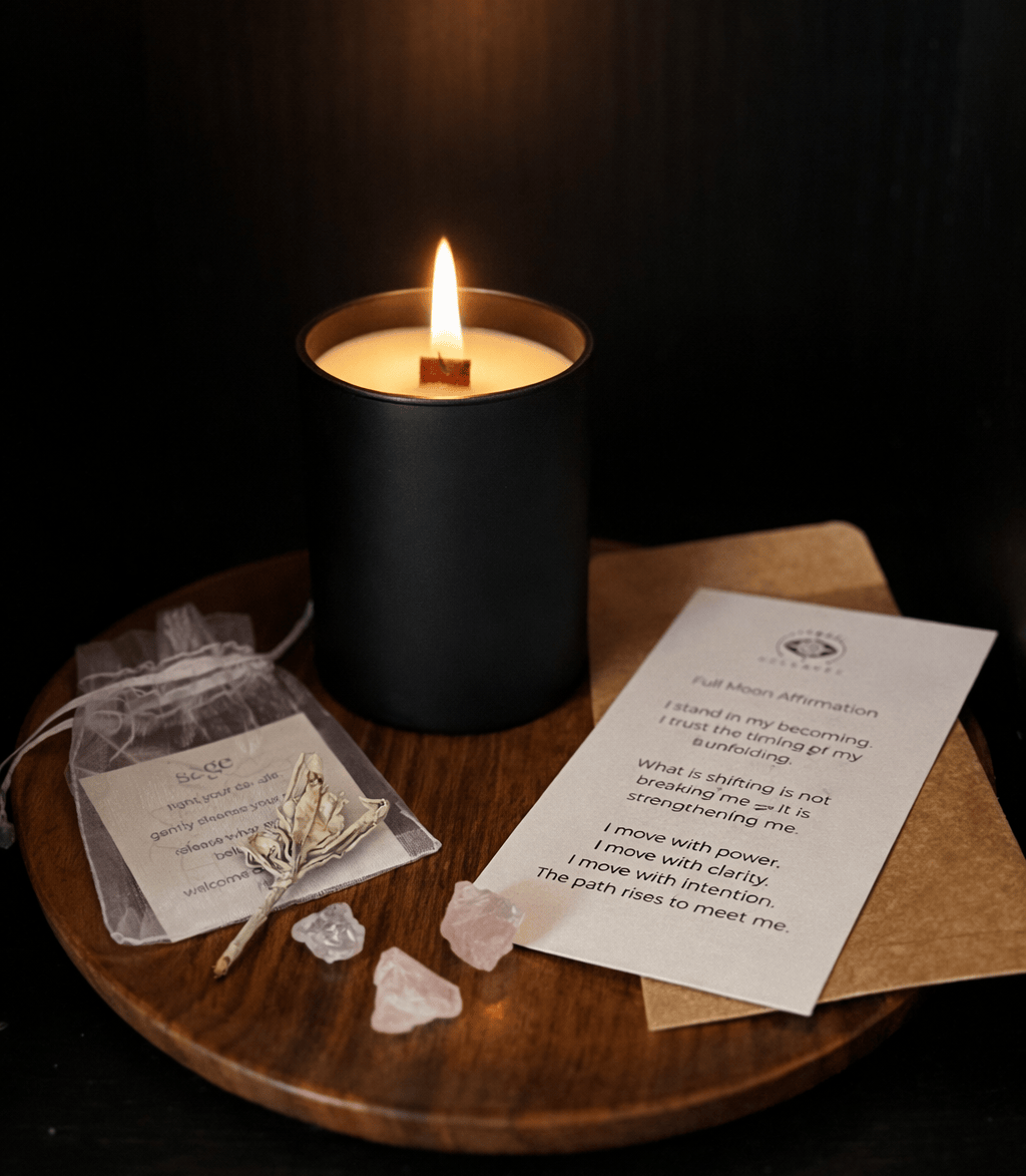 Candle burning on a wooden surface with ritualistic items and a piece of paper.
