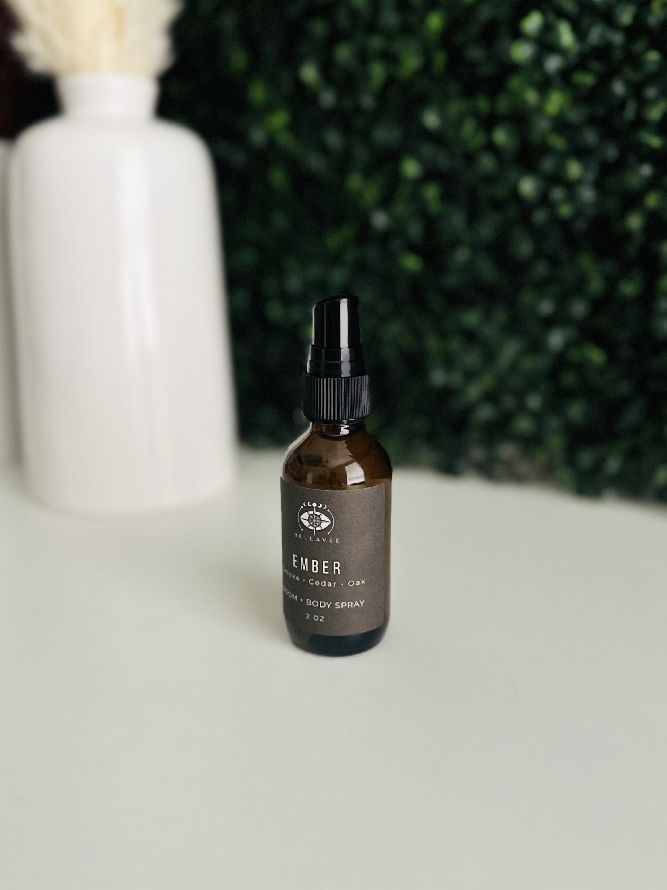 Woodsy room and body spray featuring smoke cedar and oak by BellaVee