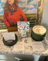 Client photo of BellaVee crystal candle and journal on altar