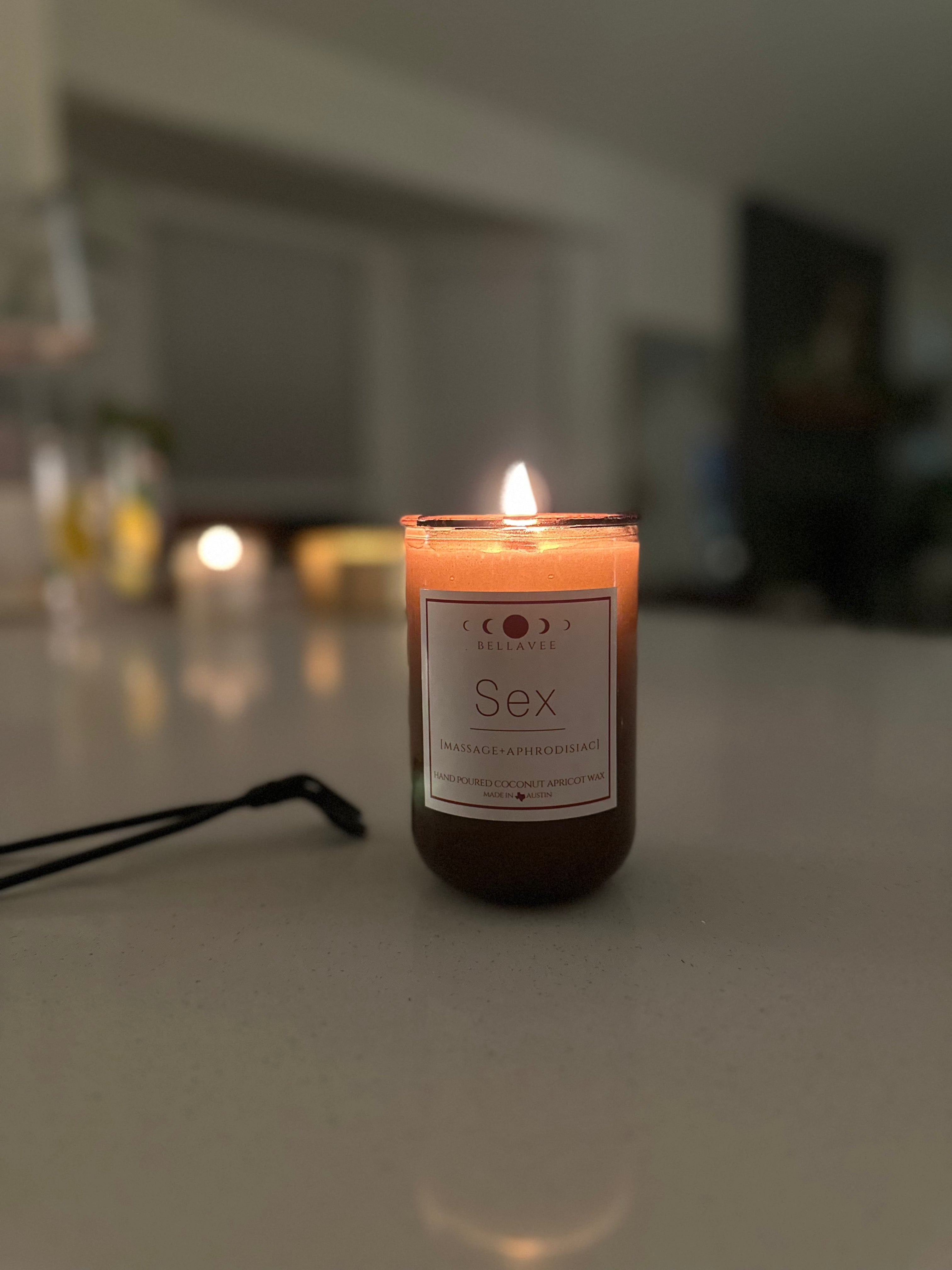 Massage Candle it with dim lighting. Clary Sage 13 oz candle for massage. Apricot coconut all natural wax. skin safe.