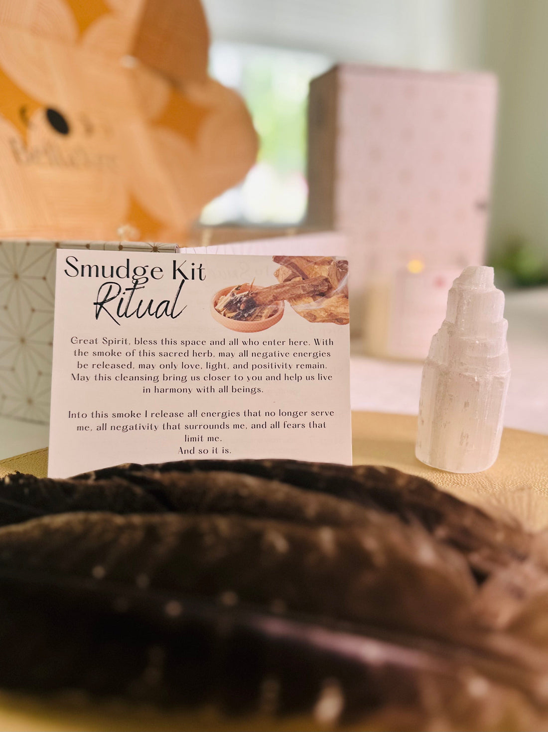 Complete Smudge Kit includes a feather, abalone shell, selenite tower, Palo Santo incense, and your choice of sage or Palo Santo