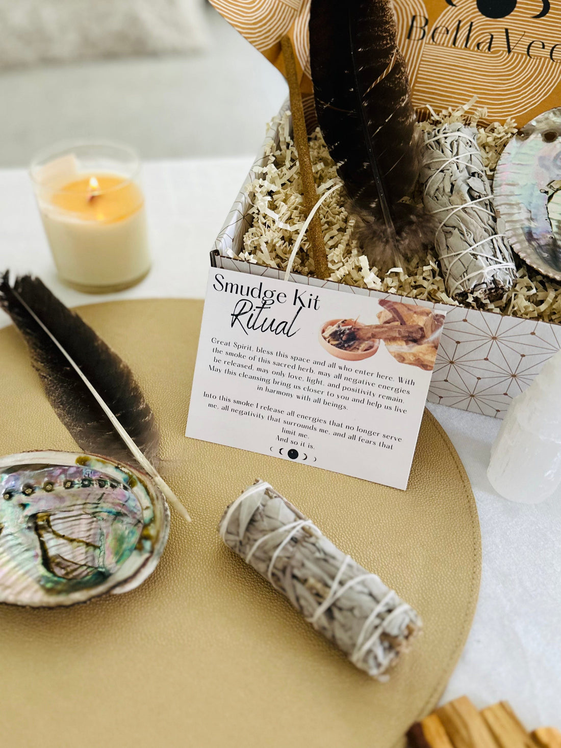 BellaVee Smudge Kit with a feather, abalone shell, selenite tower, Palo Santo incense, and your choice of sage or Palo Santo bundle