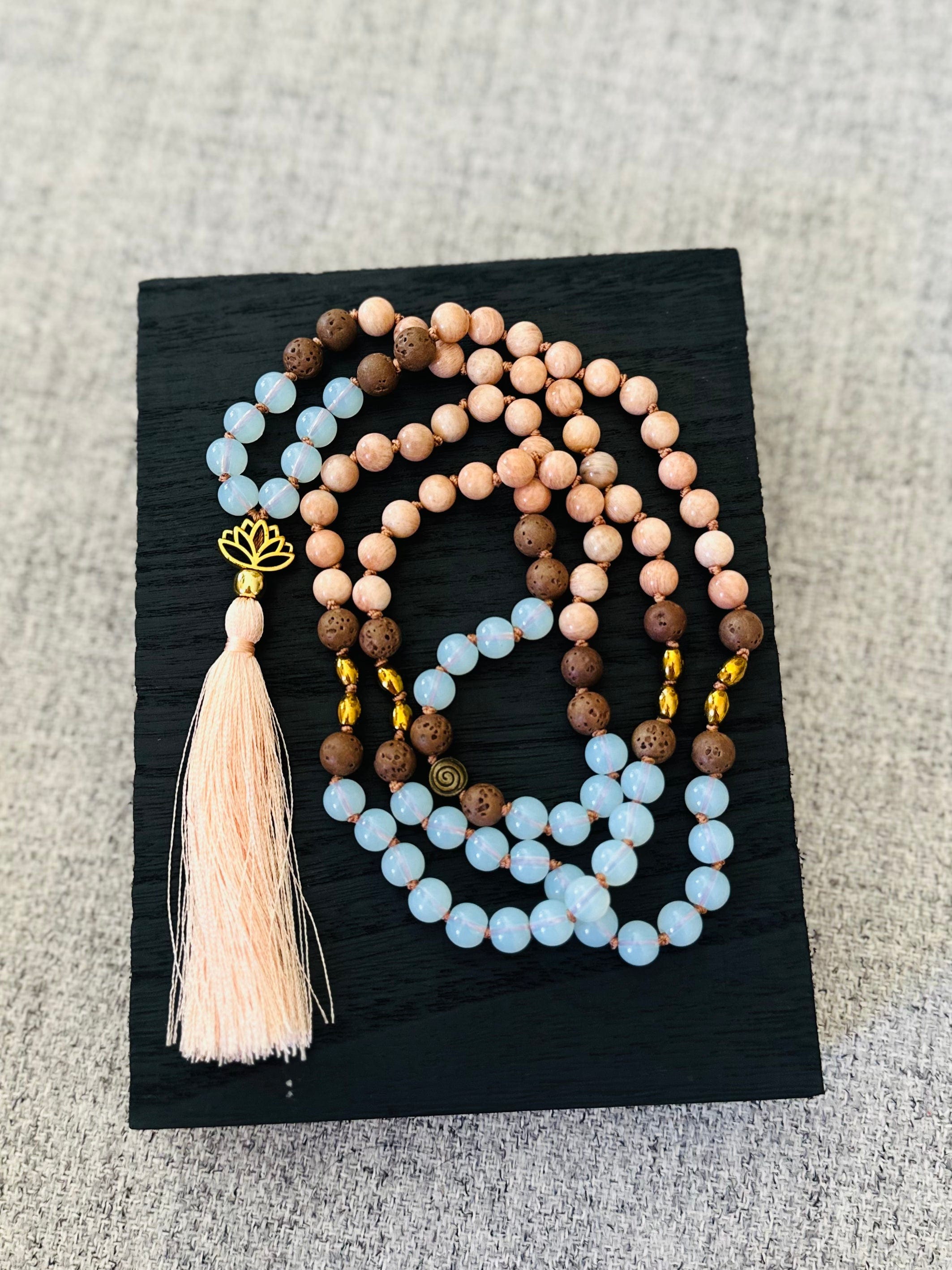 Inner Harmony Mala with Lava for grounding, Opalite for growth, Peach Moonstone for intuition, and Hematite for protection and clarity
