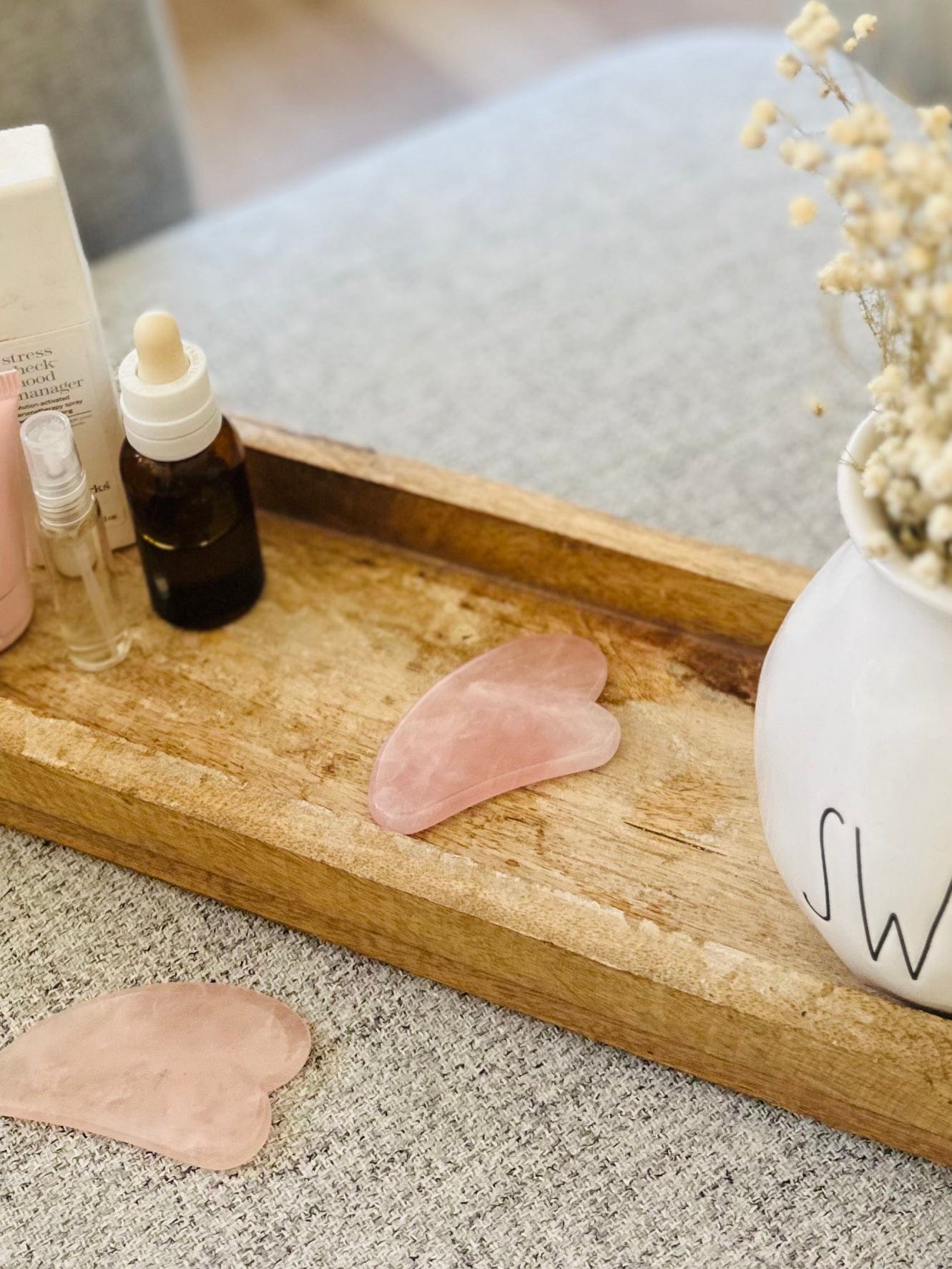Rose Quartz Gua Sha Tool, designed to soothe and lift skin, promotes love, harmony, and natural radiance during facial massage