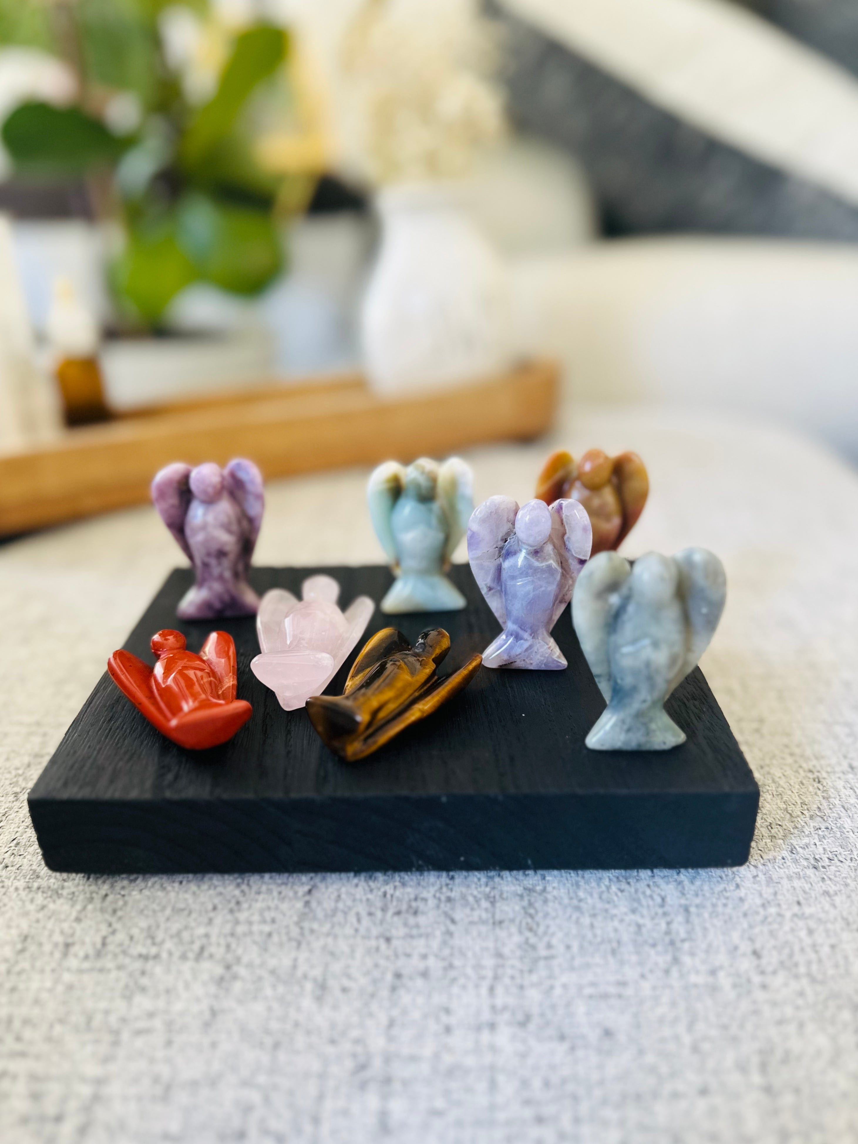 Angel Crystal Collection featuring gemstones like Red Jasper and Rose Quartz for protection and healing energy.