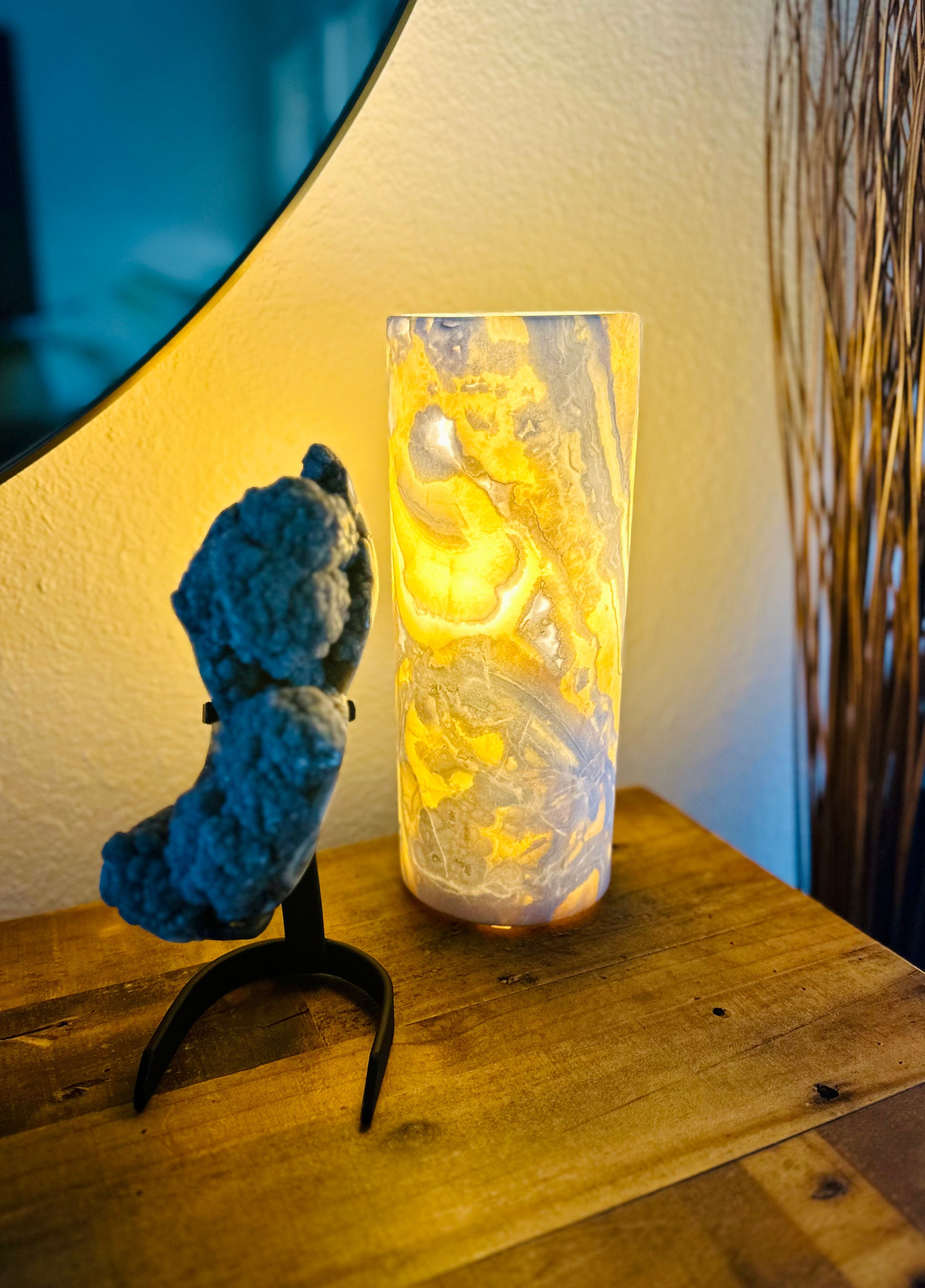 Cloudy Onyx Crystal Lamp illuminated, casting a warm, serene glow to create a tranquil atmosphere