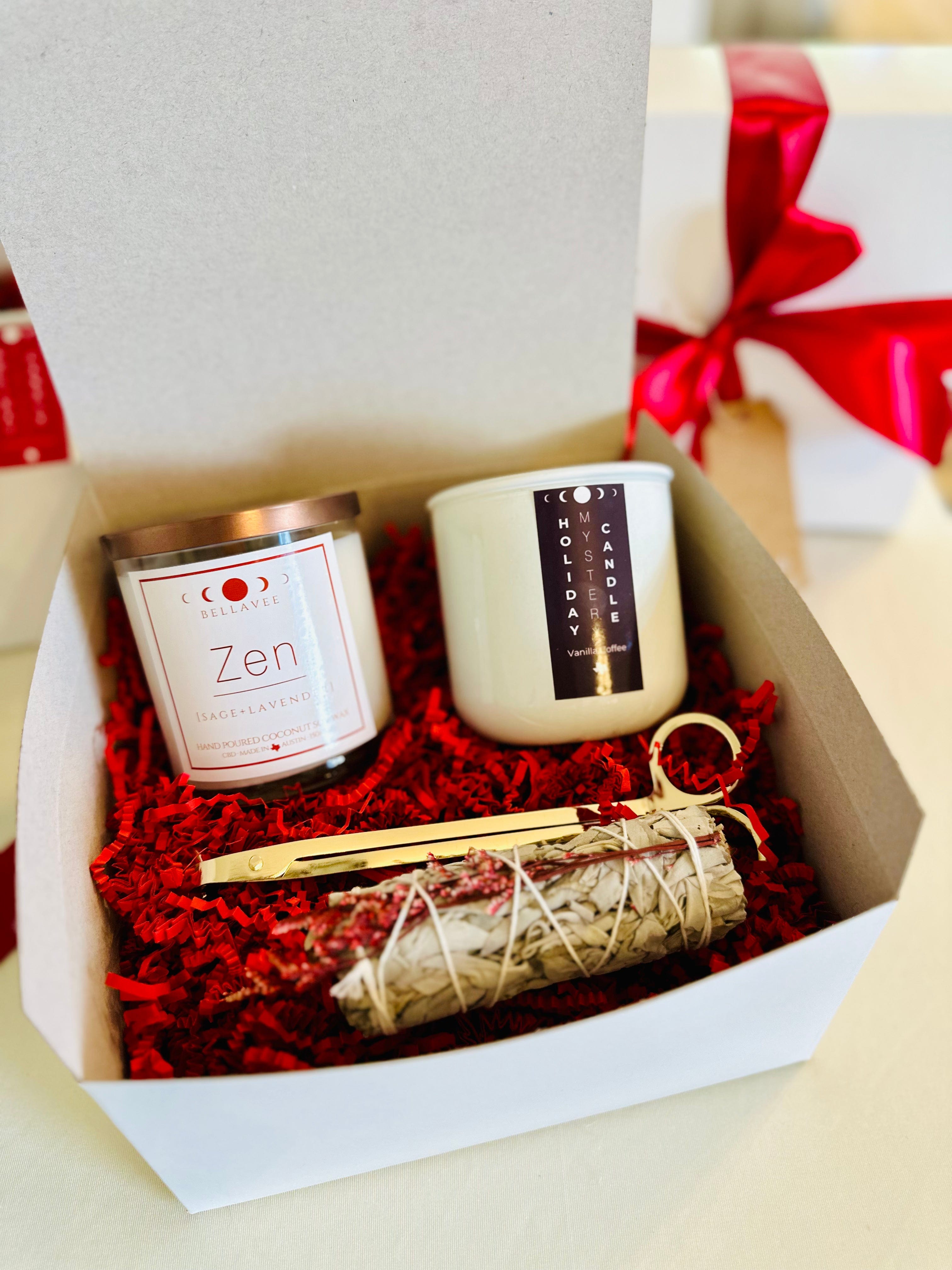 CBD candle gift box with festive candle, sage bundle, and accessories for a soothing ritual.