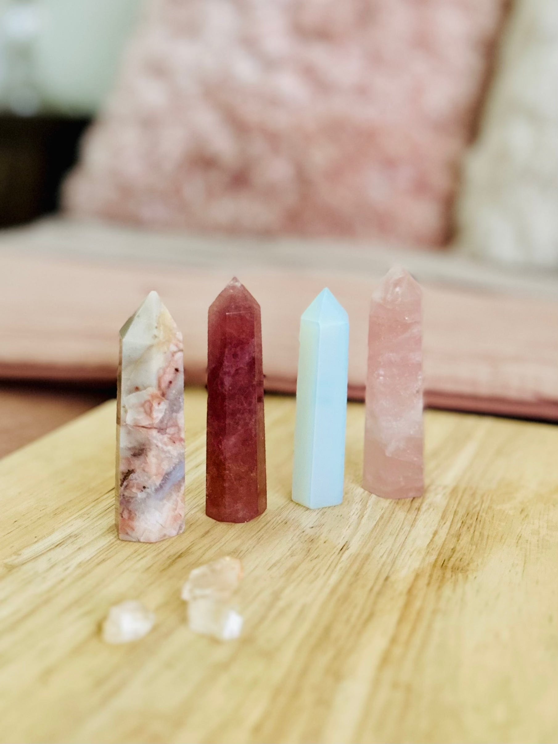 Minimalist styled ritual tools including tea, crystals, and spray.