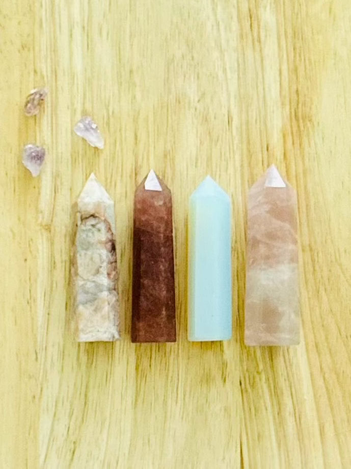 Close-up of crystal towers with wooden background