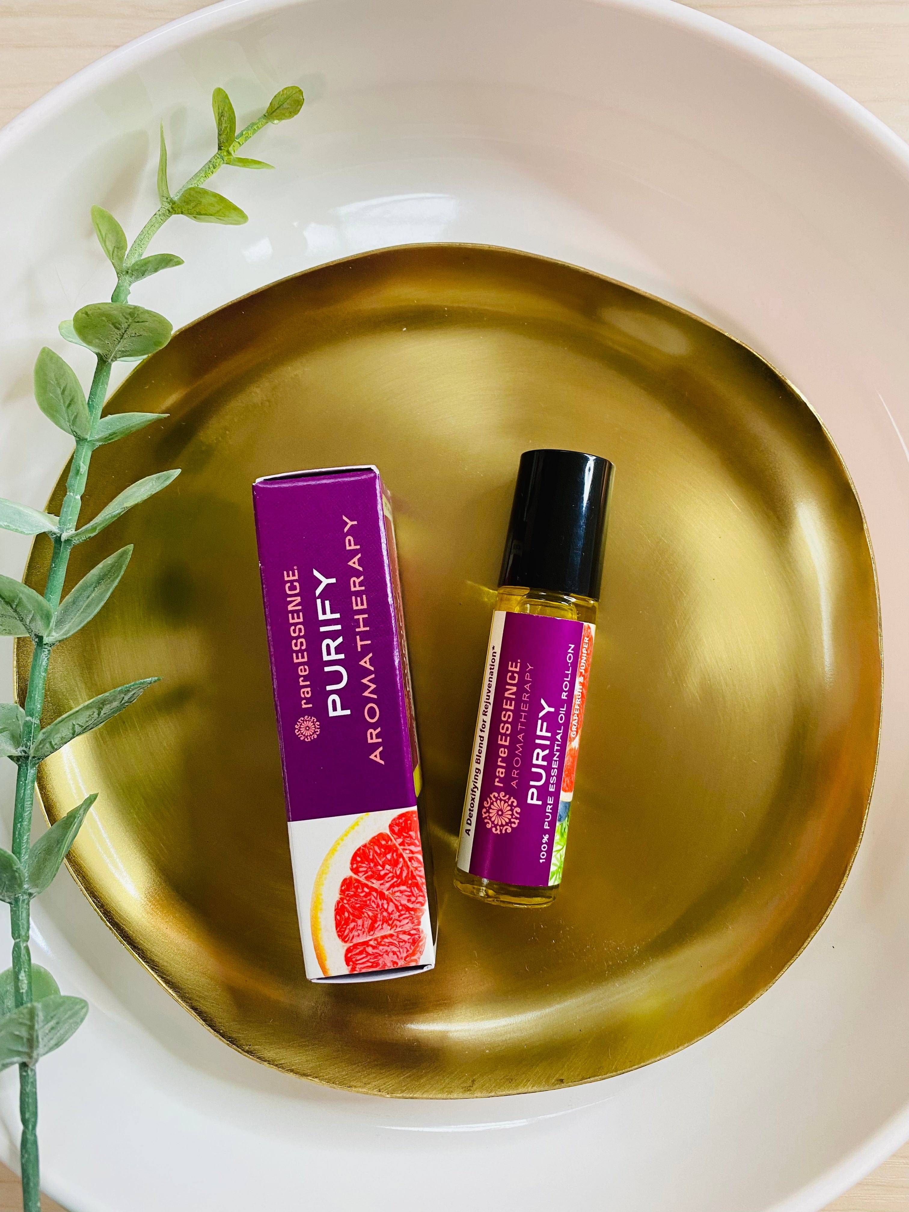 PURIFY Aromatherapy Roll-On with 100% pure essential oils like Lemon, Juniper-berry, and Palmarosa. Easy, convenient, and organic
