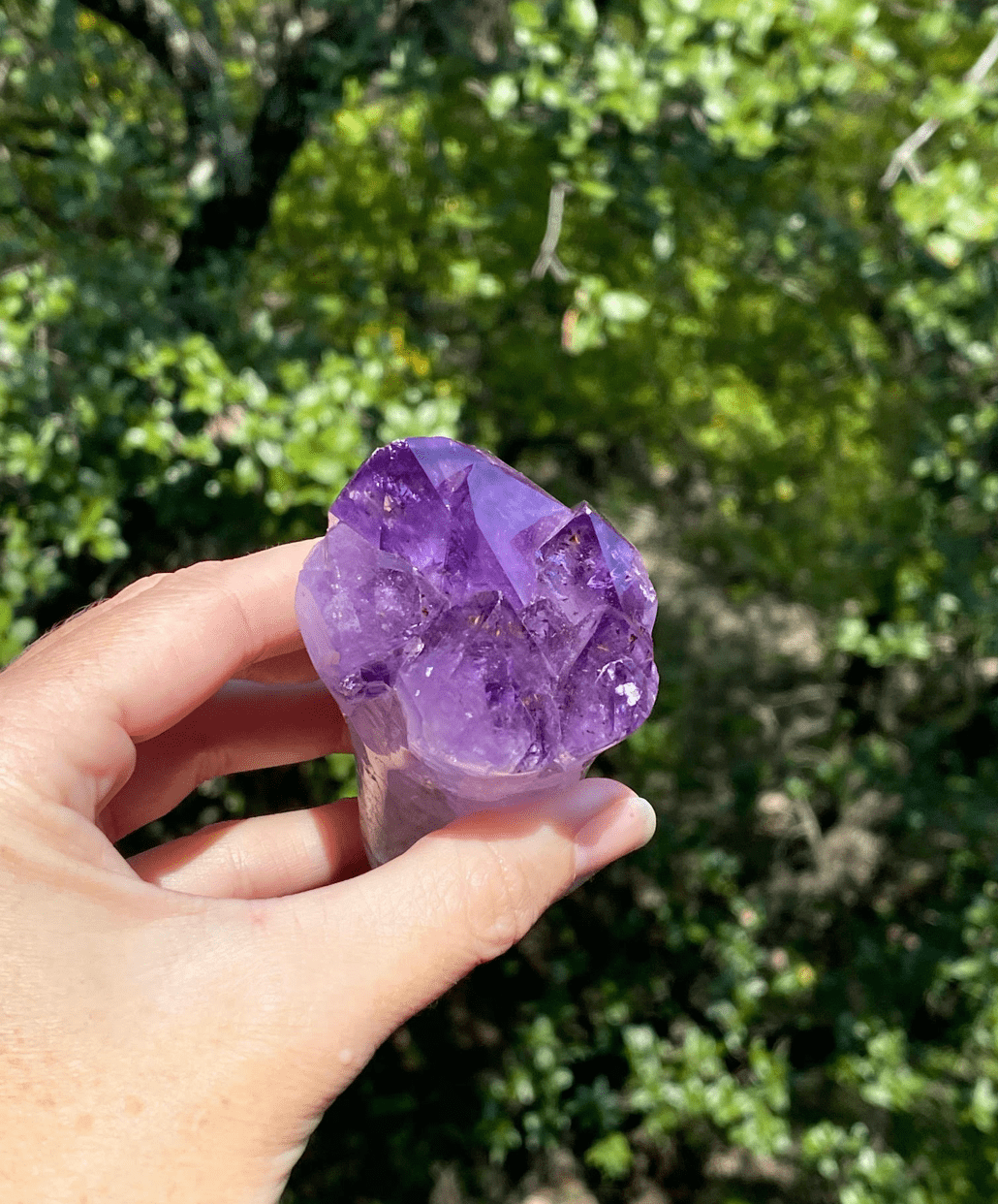 Amethyst crystal bouquet with a white banded Agate base, perfect for spiritual and chakra healing.