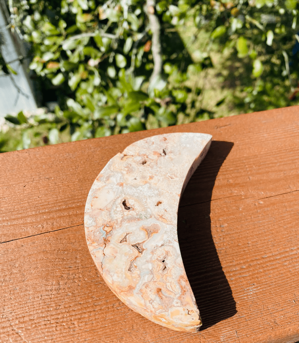 Hand-carved Sliced Agate Crescent Moon, polished to reveal natural patterns, perfect for meditation, decor, or crystal energy work