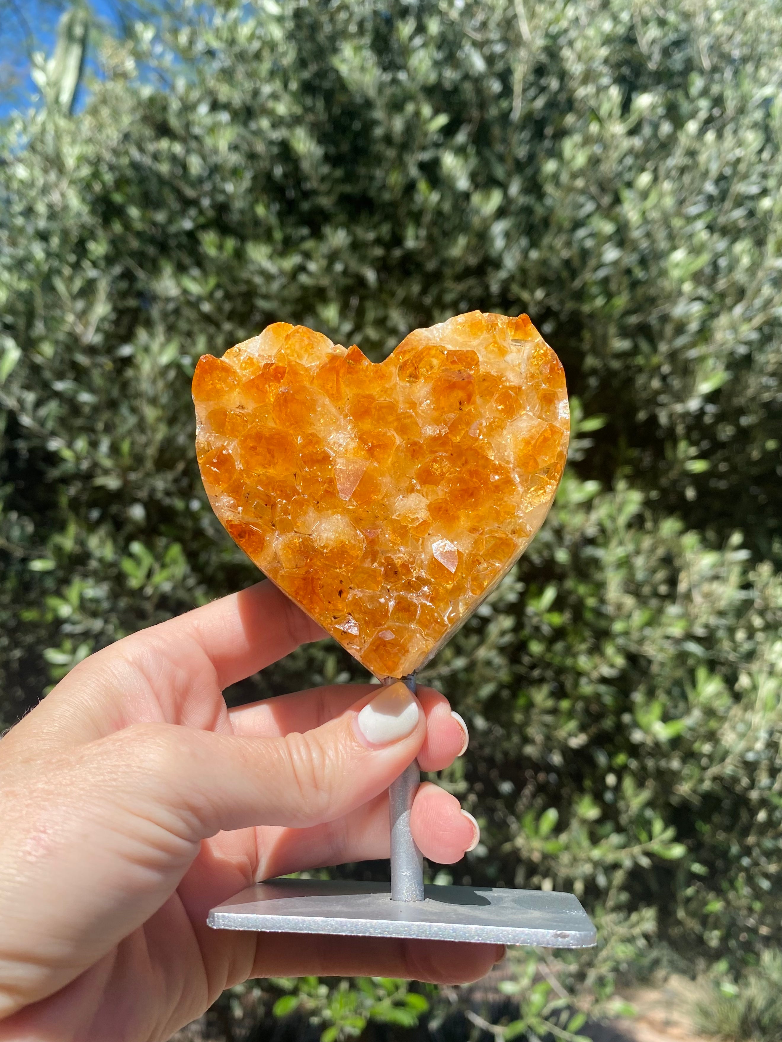 Citrine heart with vibrant amber crystals, polished edging, and Agate banding, known for boosting self-esteem and confidence