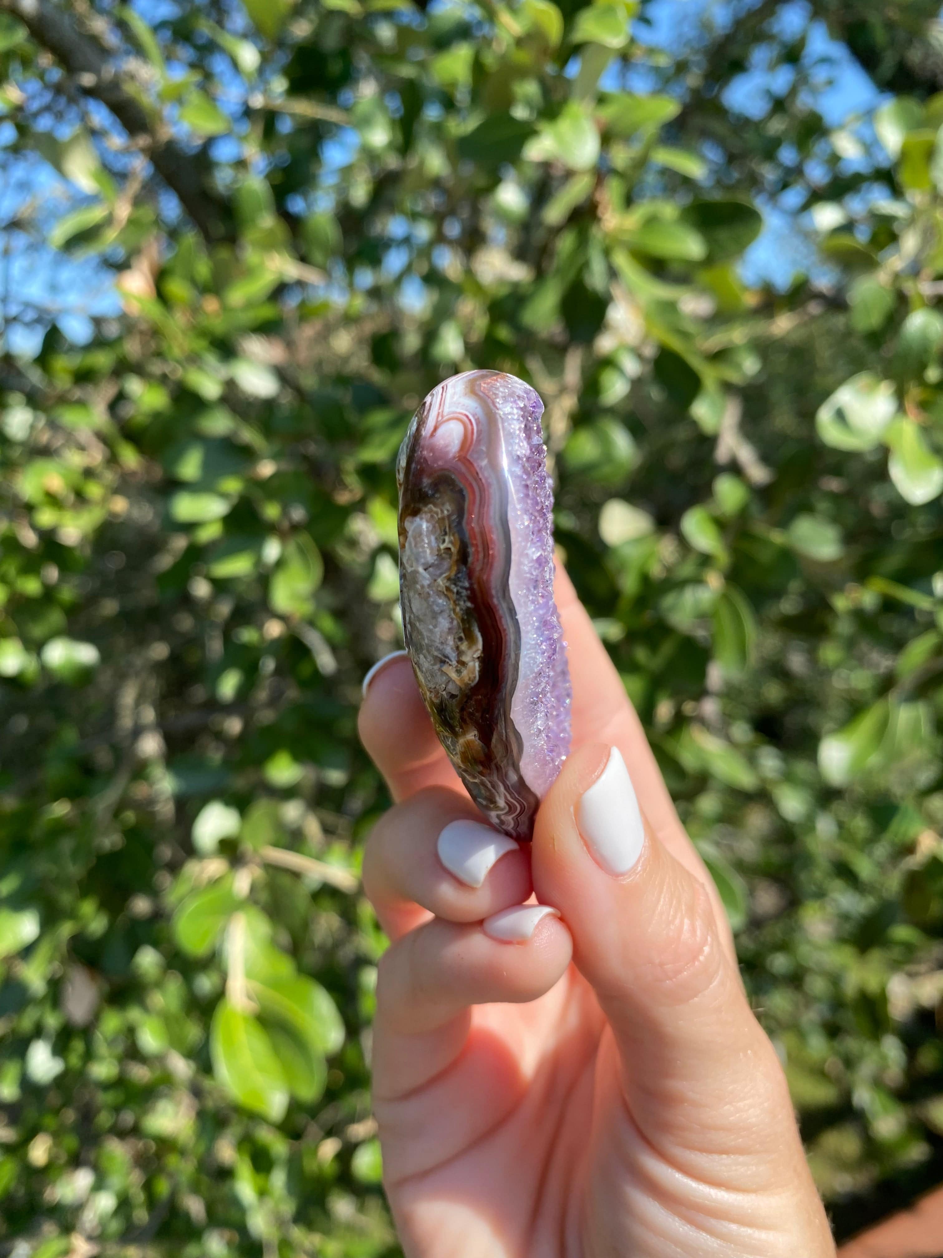Stunning Amethyst heart with Brazilian Agate banding, a powerful stone for protection and energy transmutation.