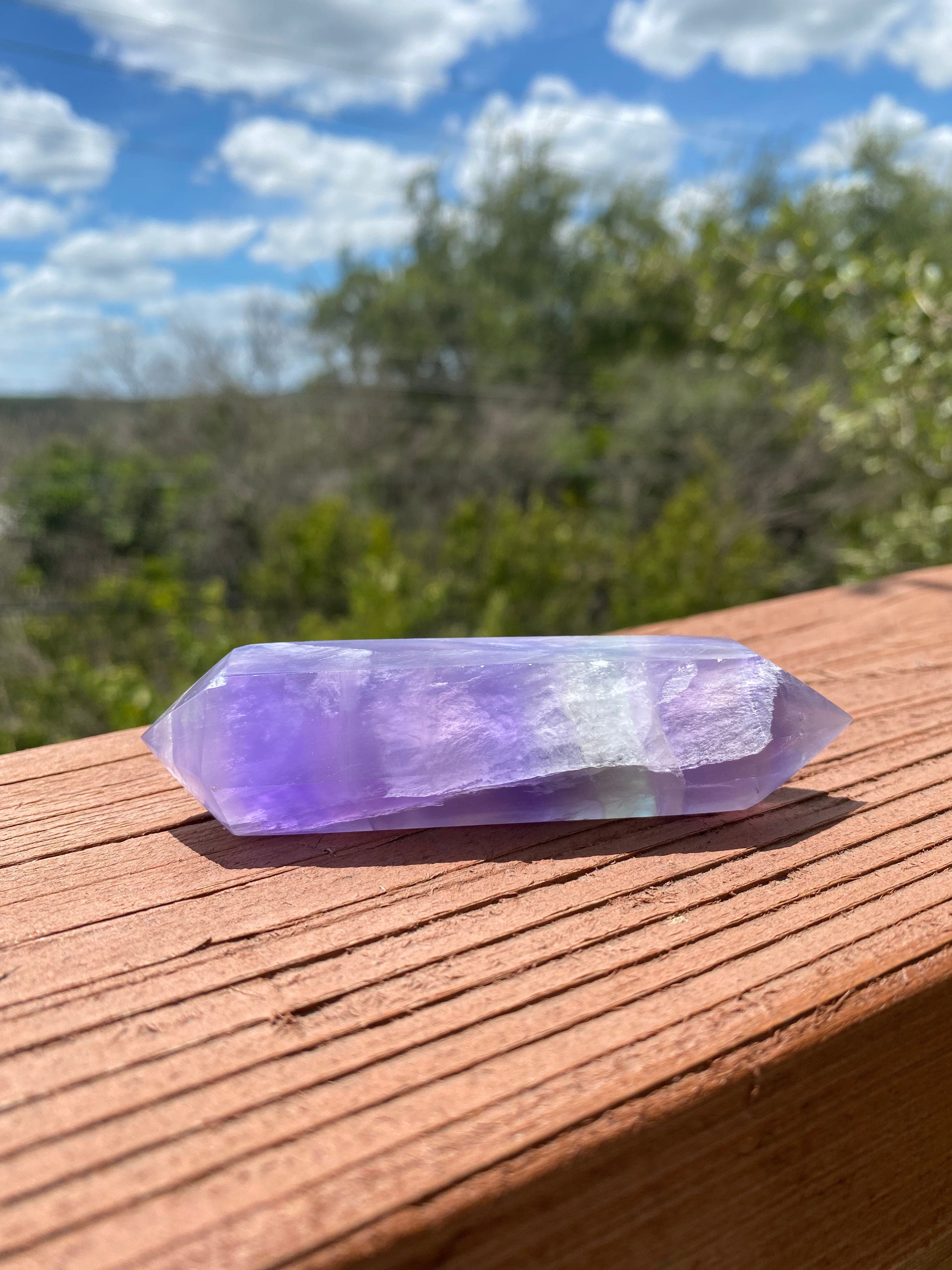 double-terminated fluorite crystal, ideal for clearing negative energy, boosting mental clarity, and bringing positive change and peace