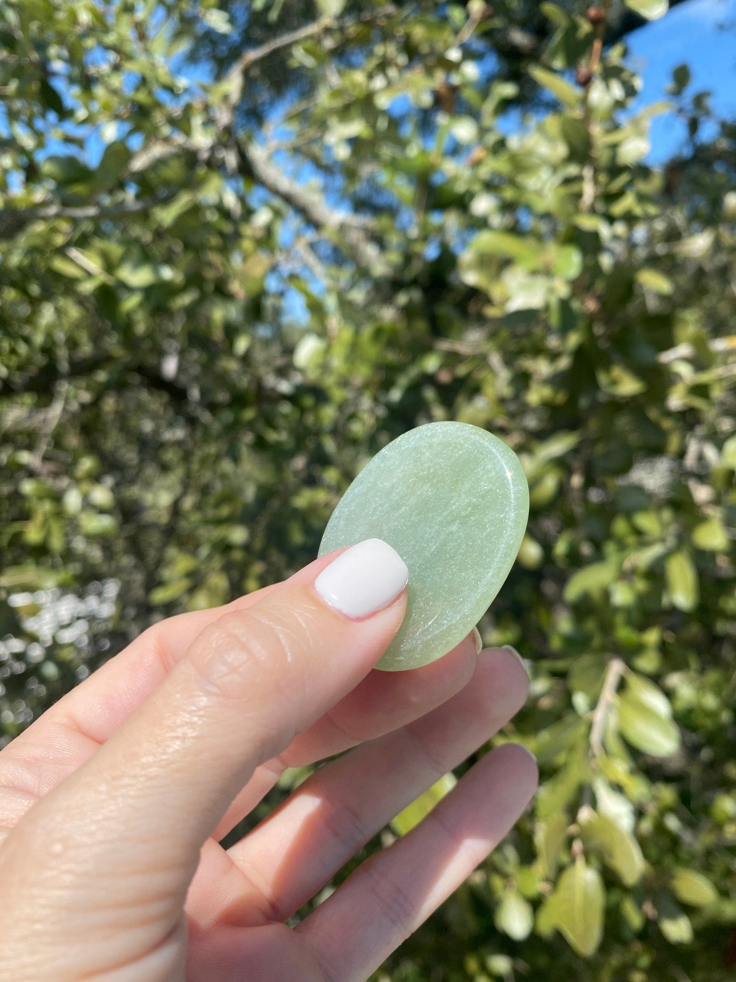 Hold the Green Aventurine Worry Stone to boost confidence, open your heart chakra, and fill yourself with a positive attitude