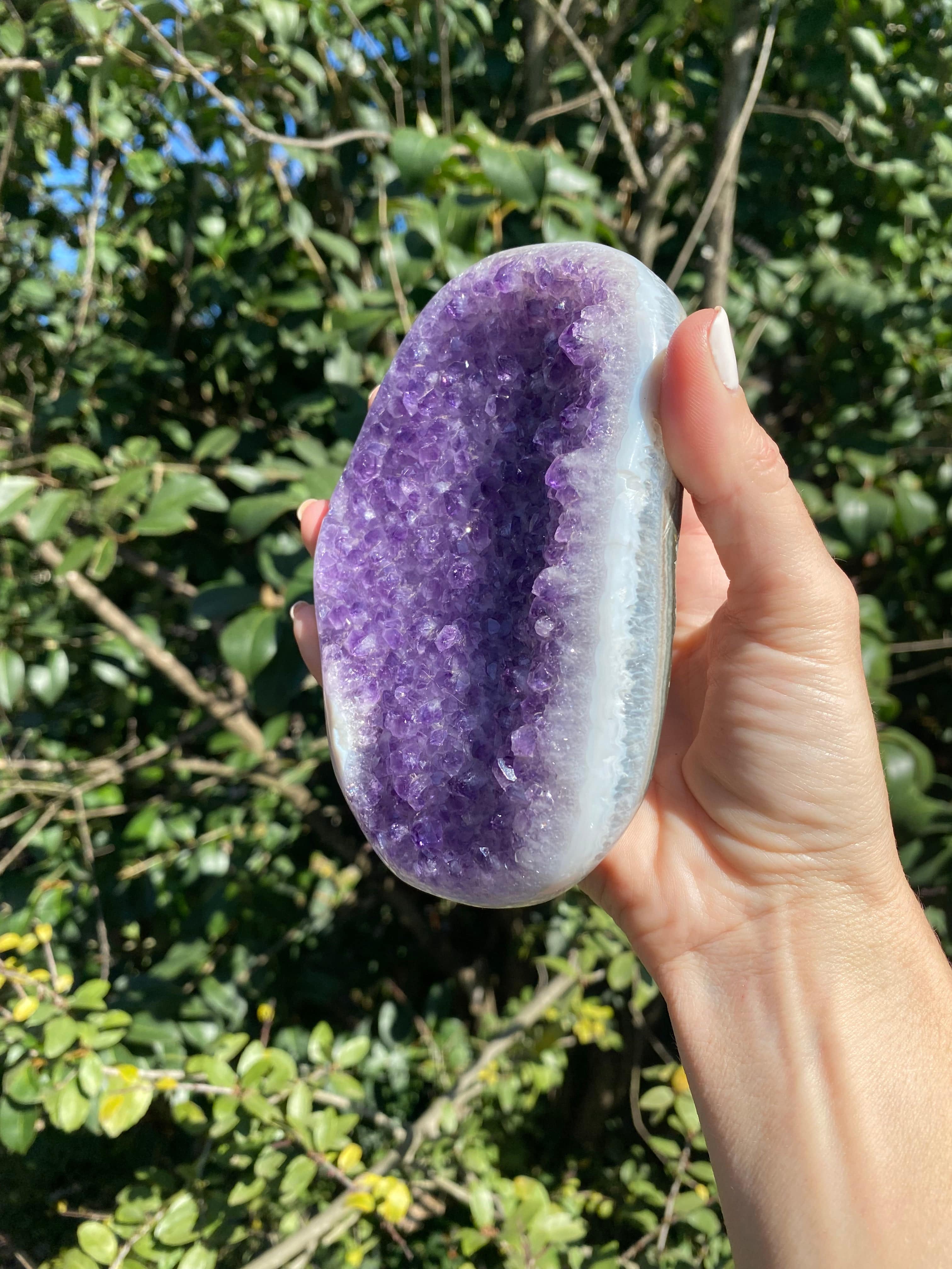 Amethyst crystal with blue and white Agate banding, promoting spiritual connection and alleviating anxiety.