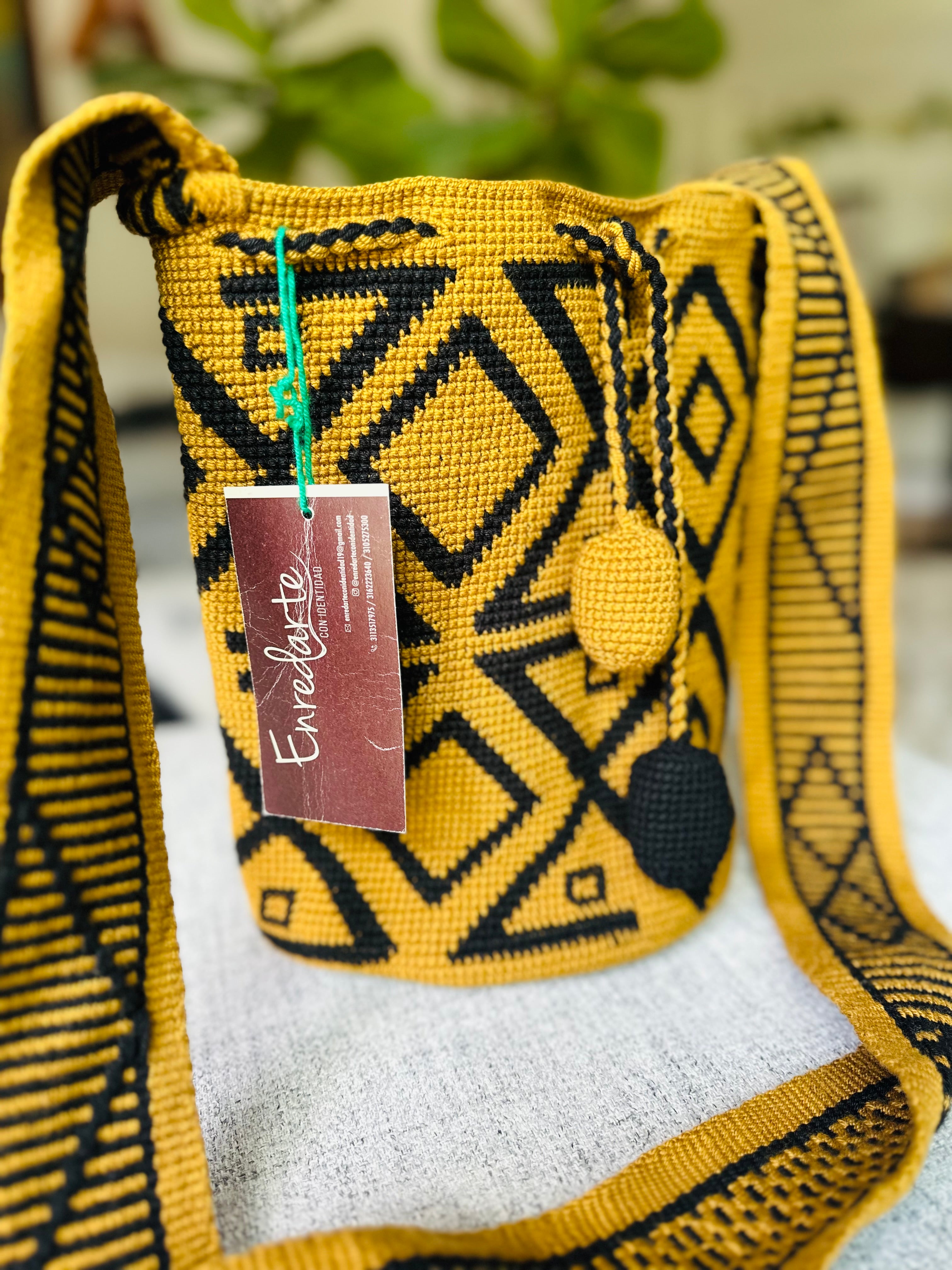 Spacious enough for your phone, wallet, and daily items, the CodeSpa Cardinal Points Bag adds style and cultural heritage to your look