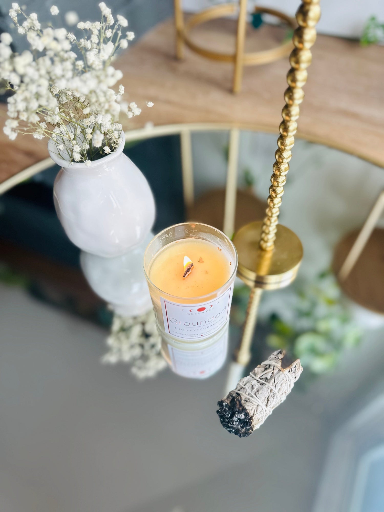 Tigers Eye-infused Grounded Crystal Candle, featuring dried flowers and essential oil, promotes grounding and dispels negative energy
