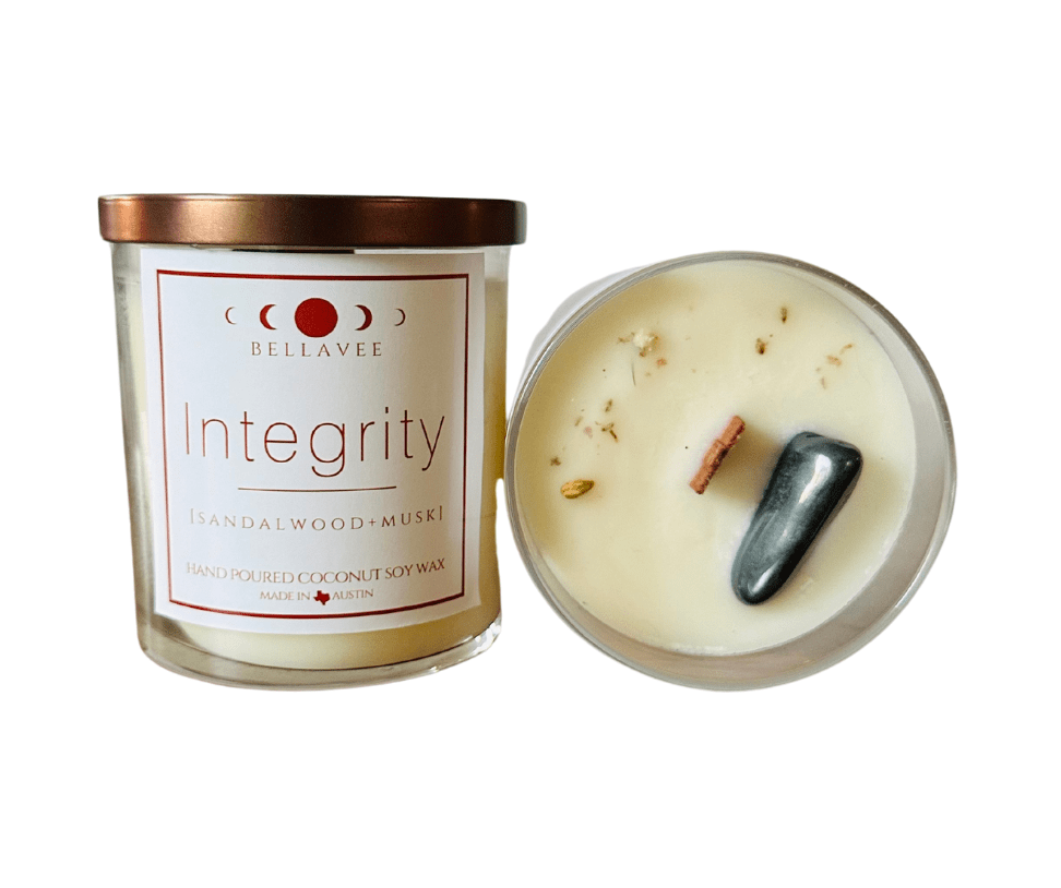 Integrity Crystal Candle with Hematite, coconut soy wax, and wooden wick, offering grounding energy and soothing aromas of sea salt and sandalwood