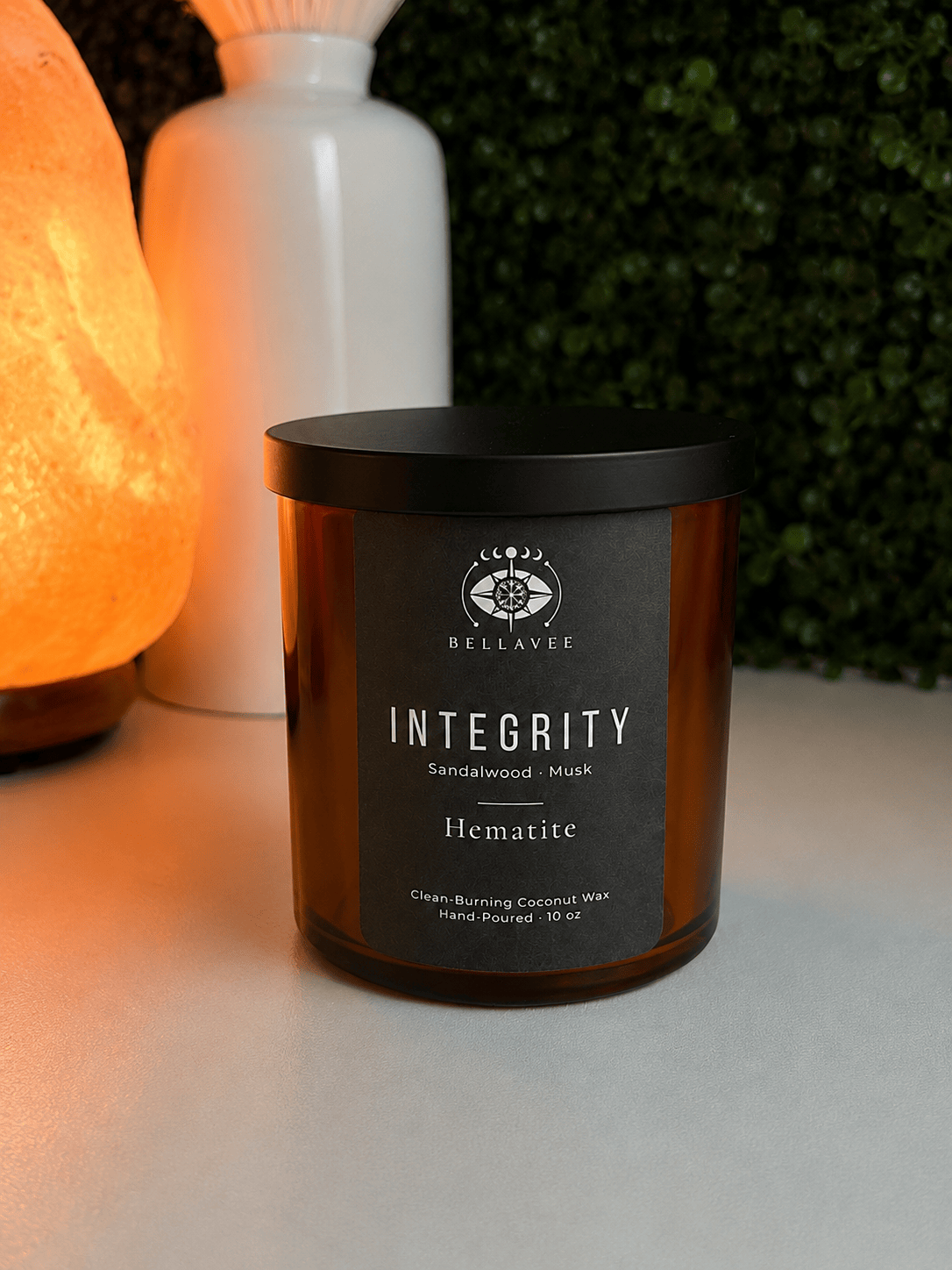 Integrity sandalwood musk Hematite crystal candle by BellaVee in amber vessel