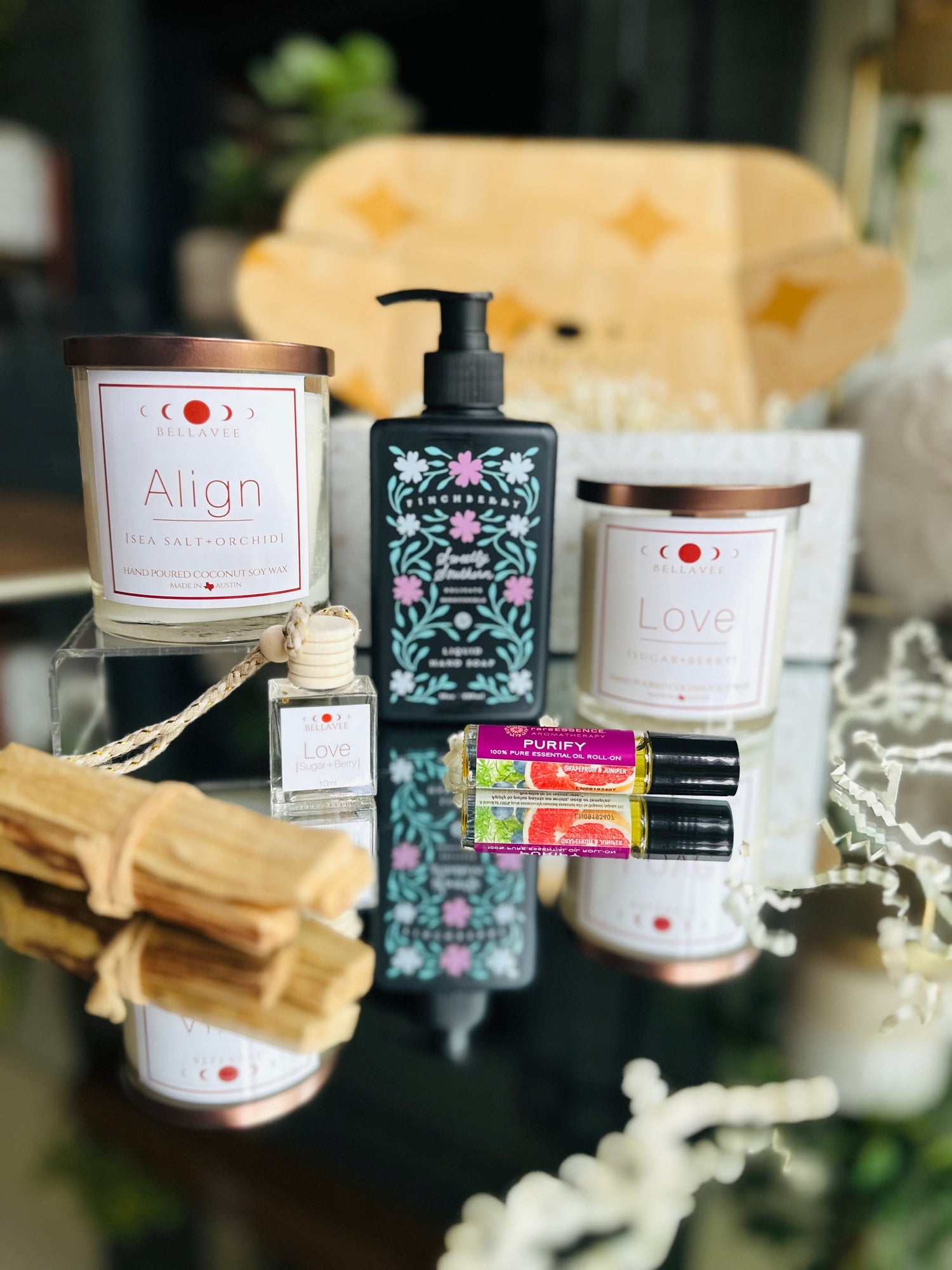 New Home Firsts Gift Set: Includes two crystal candles, roll-on essential oil, liquid hand soap, and Palo Santo, perfect for relaxation and rejuvenation