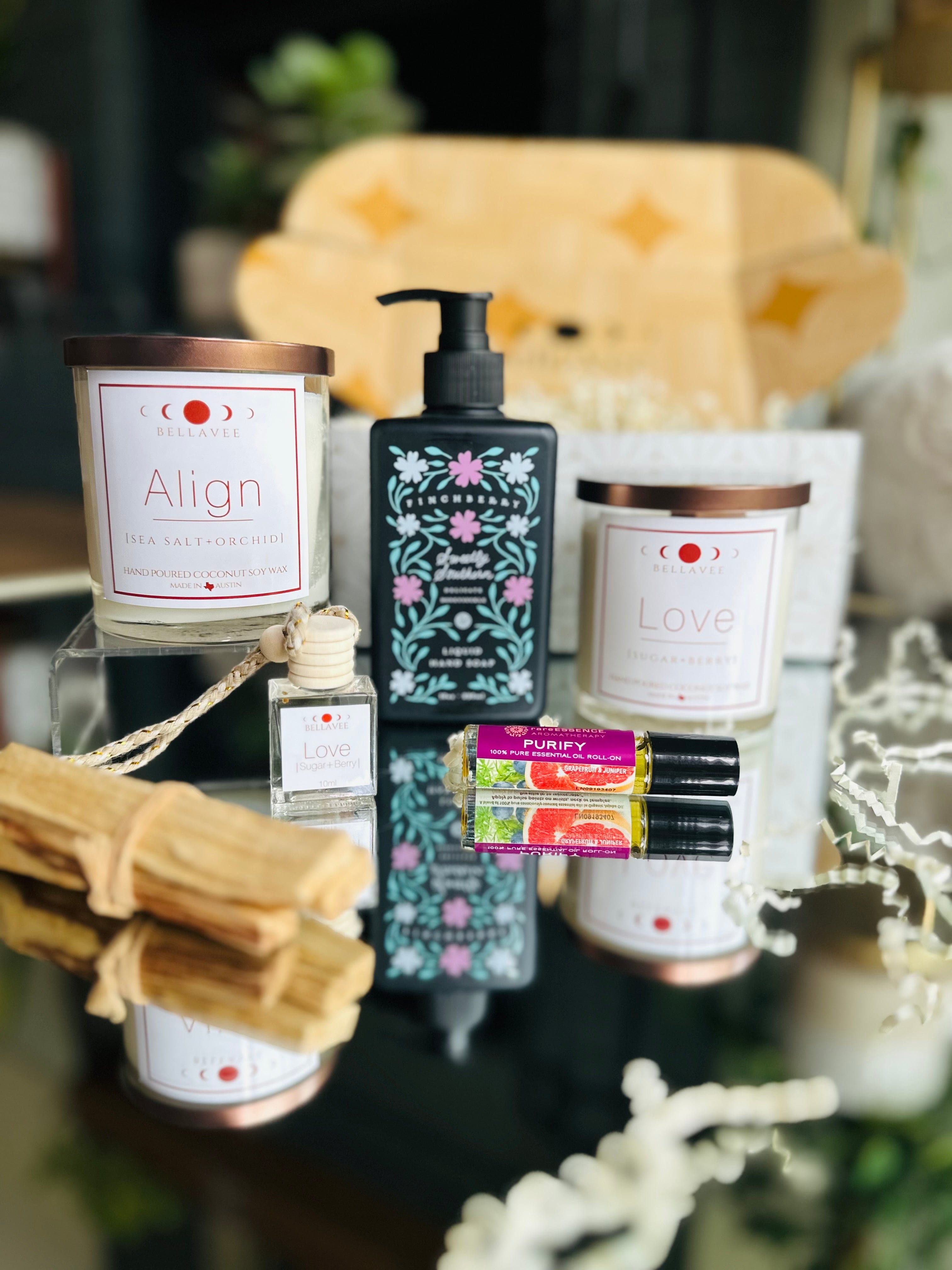 New Home Firsts Gift Set: Includes two crystal candles, roll-on essential oil, liquid hand soap, and Palo Santo, perfect for relaxation and rejuvenation