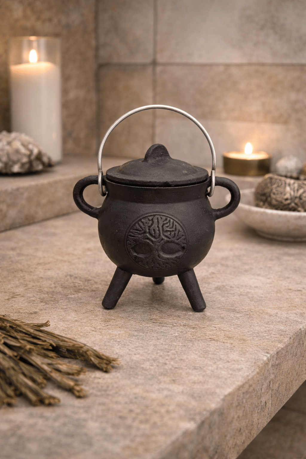 Cast iron Tree of Life incense cauldron for burning charcoal incense and resin.