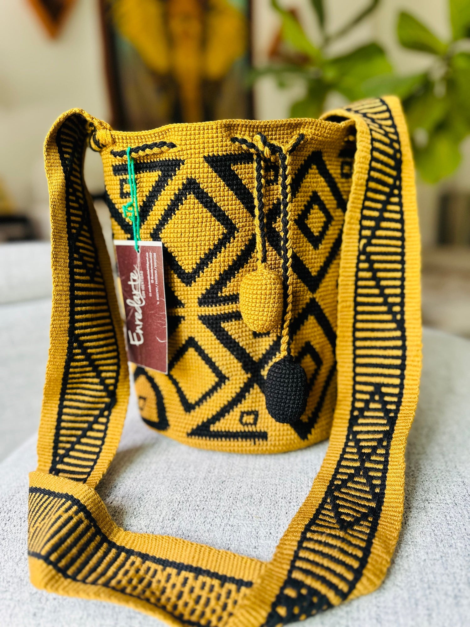 Handcrafted over 30 days, the CodeSpa Cardinal Points Crossbody Bag captures indigenous craftsmanship and cultural harmony