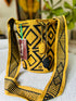 Handcrafted over 30 days, the CodeSpa Cardinal Points Crossbody Bag captures indigenous craftsmanship and cultural harmony