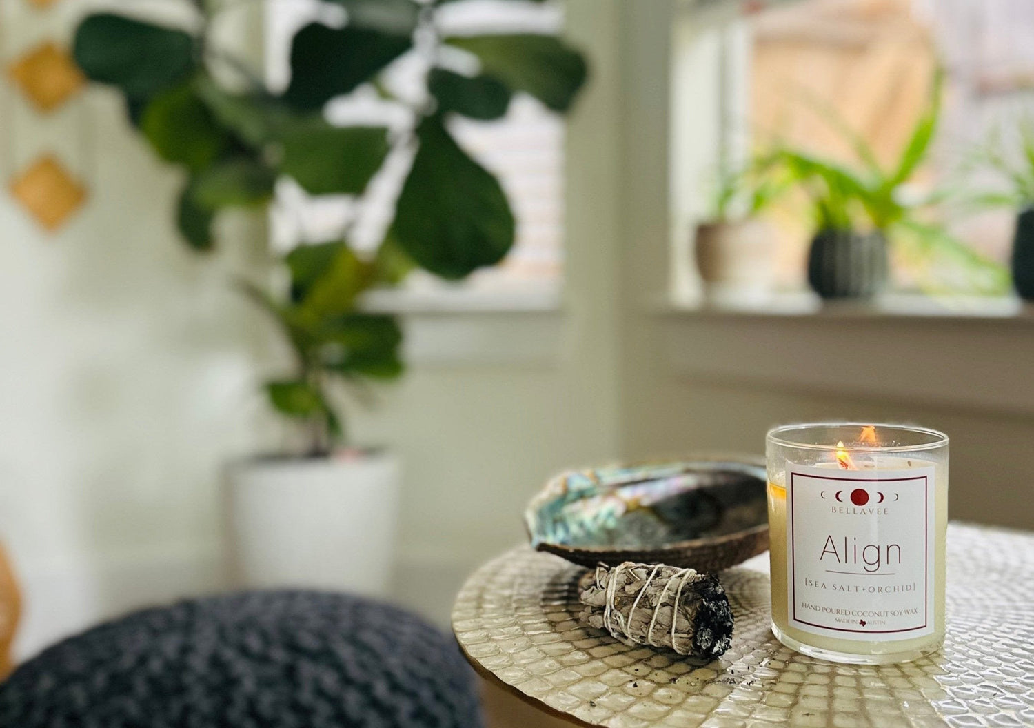 all natural meditation crystal candle topped with a clear quartz crystal, infused with crystals for mindfulness and relaxation, made with eco-friendly coconut wax