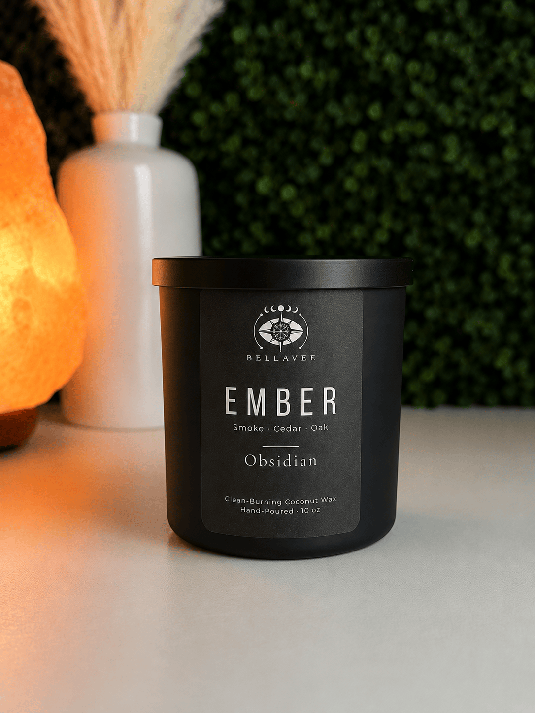 Black candle labeled &