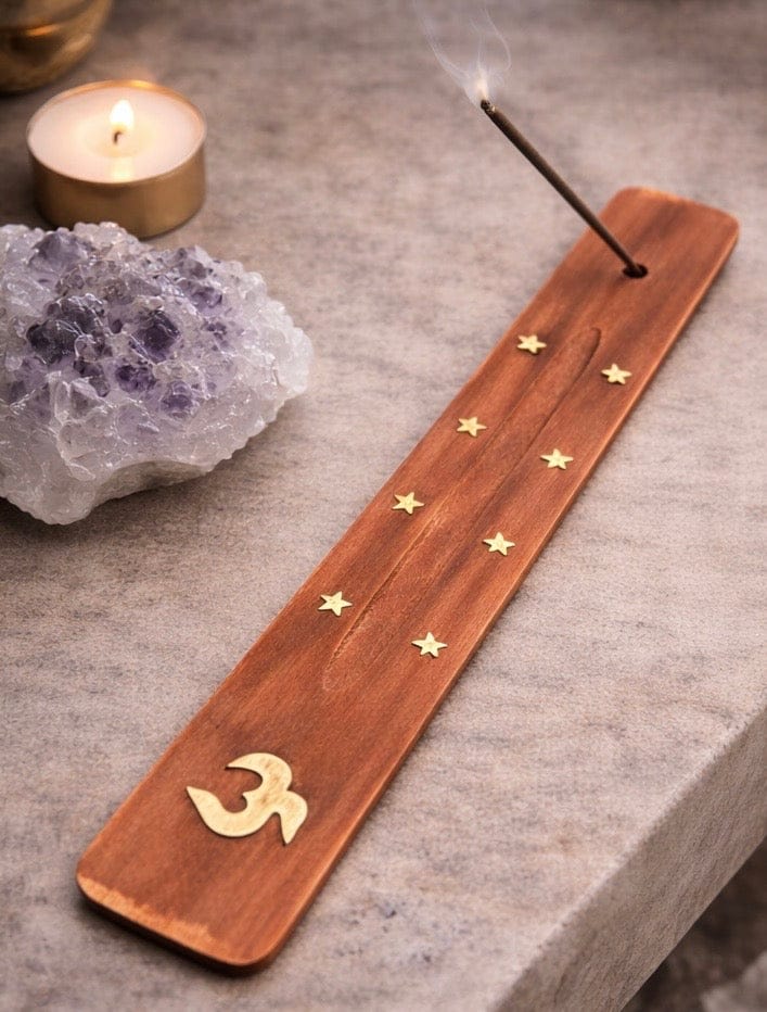 Om wooden incense holder with brass stars for meditation and incense burning.