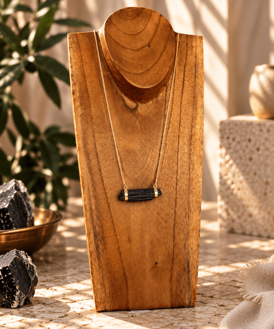 Raw Black Tourmaline bar necklace on long gold chain by BellaVee Rituals