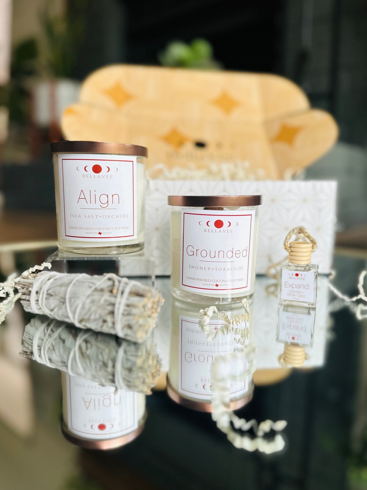 New Beginnings Gift Box: Includes two crystal-infused candles, a handmade crystal car diffuser, and a sage bundle for a serene home atmosphere