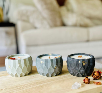 Candle trio showing light, medium, and dark cement finishes
