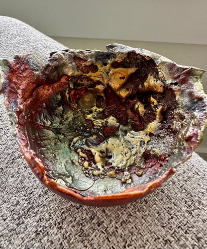 Close-up of copper bowl rim showing unique form and depth