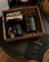 BellaVee THE CLEARING Energetic Eviction Ritual Kit with amber crystal candle, smoky quartz, black tourmaline, sage, palo santo, selenite, and ritual card.