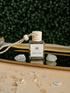 BellaVee Moon Tide crystal car diffuser infused with moonstone and a blend of ocean air, nag champa, and coconut. Handcrafted non-toxic car air freshener for relaxation, mindful driving, and intentional living.