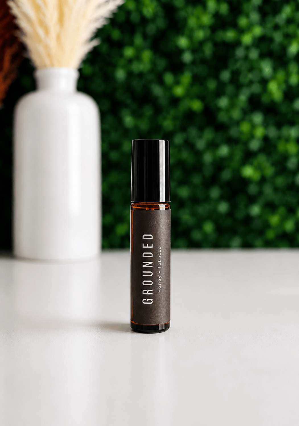 BellaVee Grounded roll-on oil featuring honey tobacco and tonka fragrance
