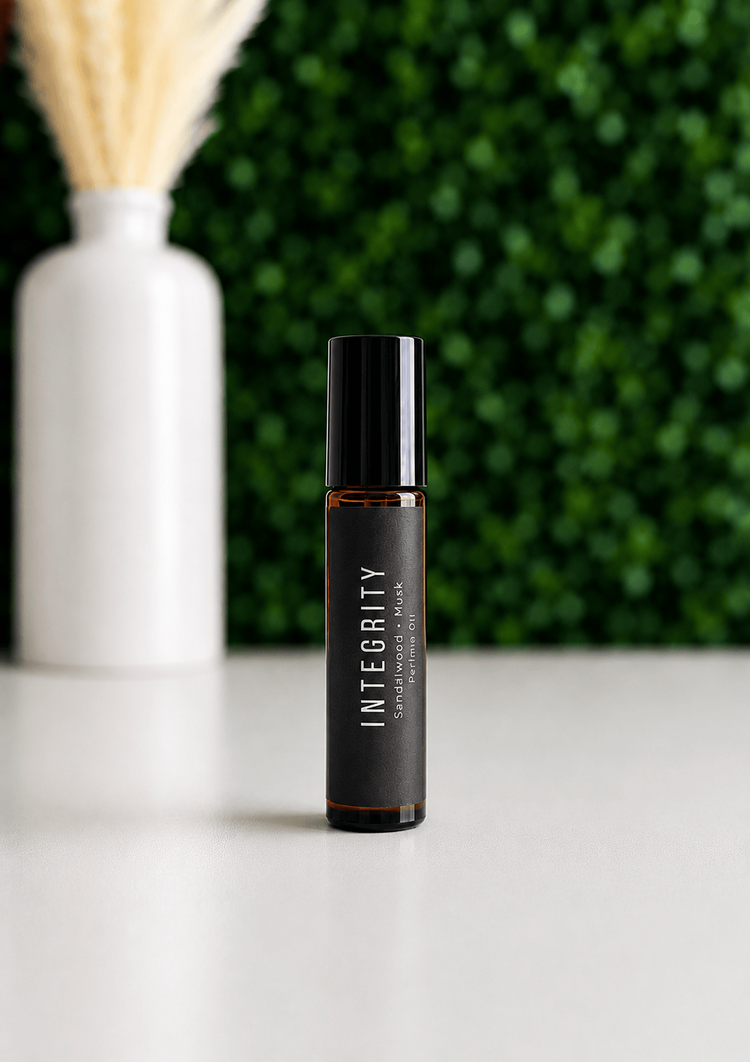 BellaVee Integrity roll-on oil featuring sandalwood and musk fragrance
