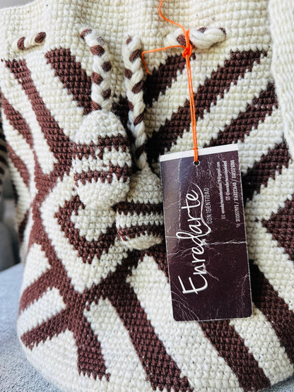 cosmic space crossbody bag, celebrating indigenous nasa culture, handcrafted with natural fibers, representing spiritual connection