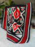 CodeSpa Cardinal Points Crossbody Bag in red and black, handmade with Hilo, Lana, and Fique fibers. Traditional Colombian craftsmanship